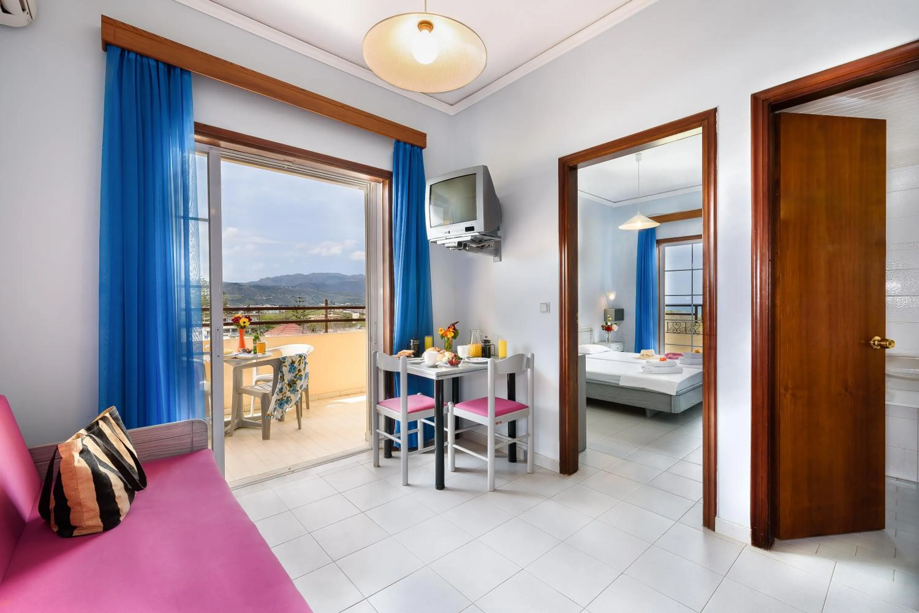 Bed in Louladakis Apartments