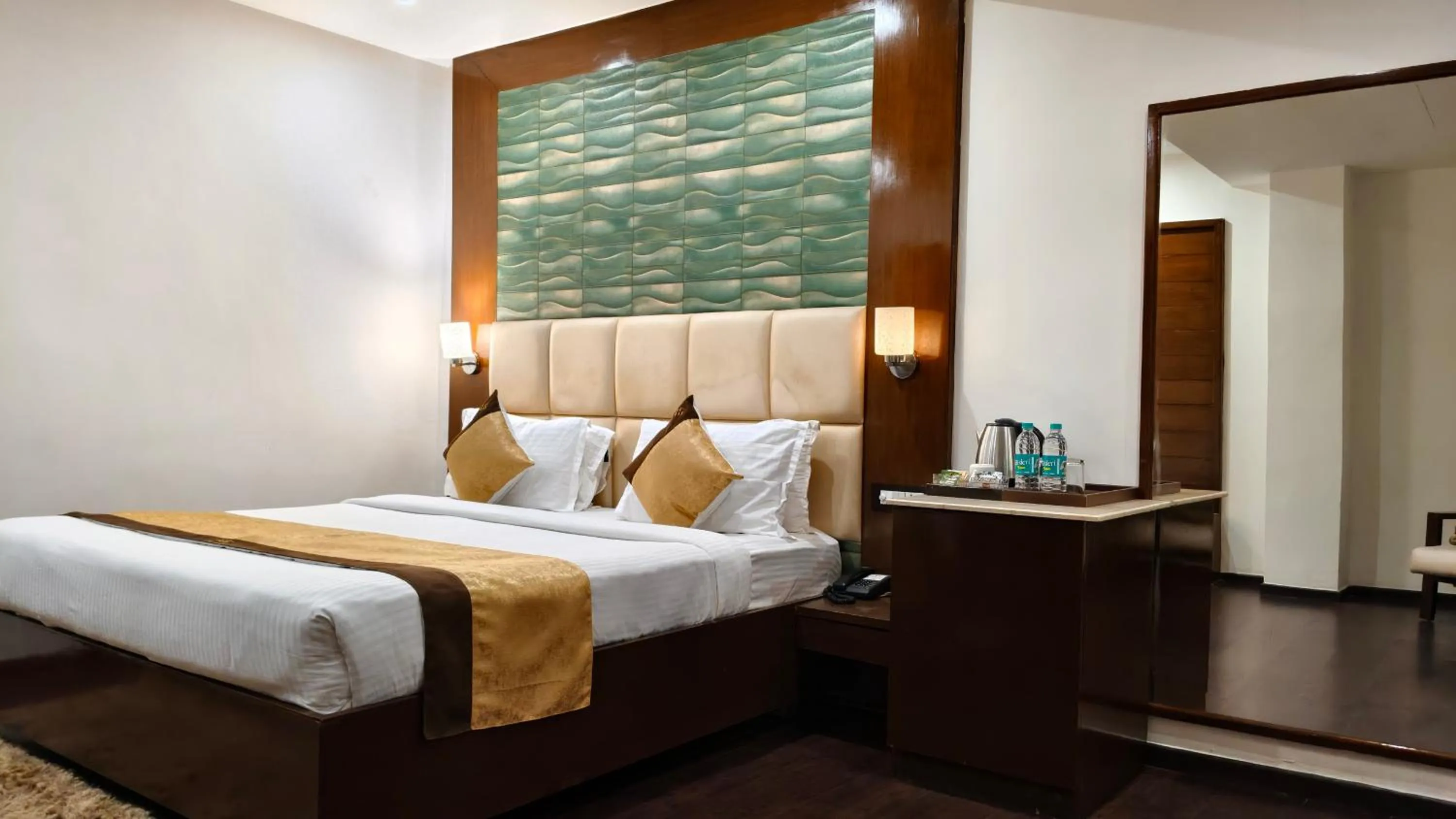 Bedroom in Hemaadri Grand