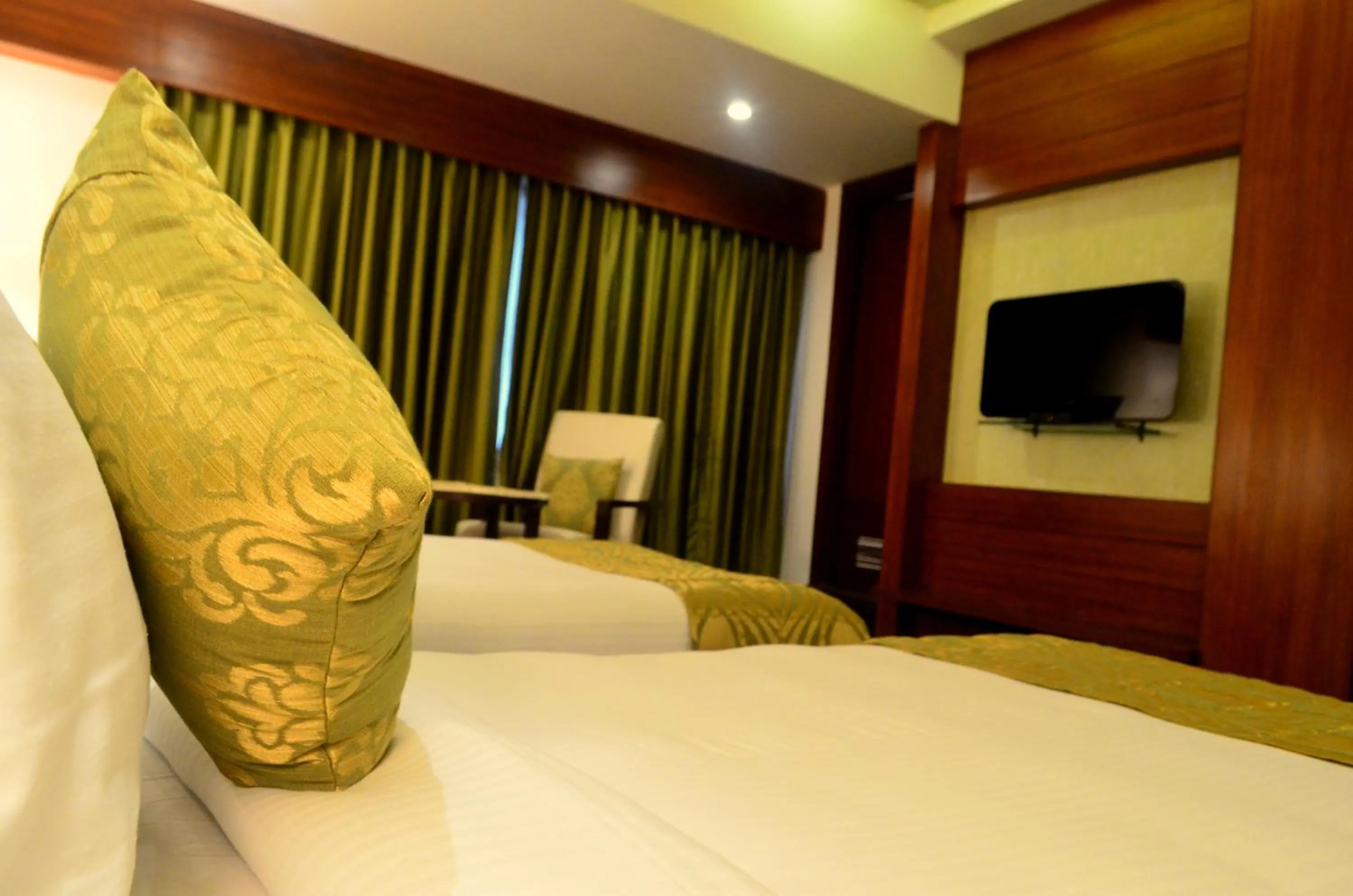 Bedroom, Bed in Hemaadri Grand