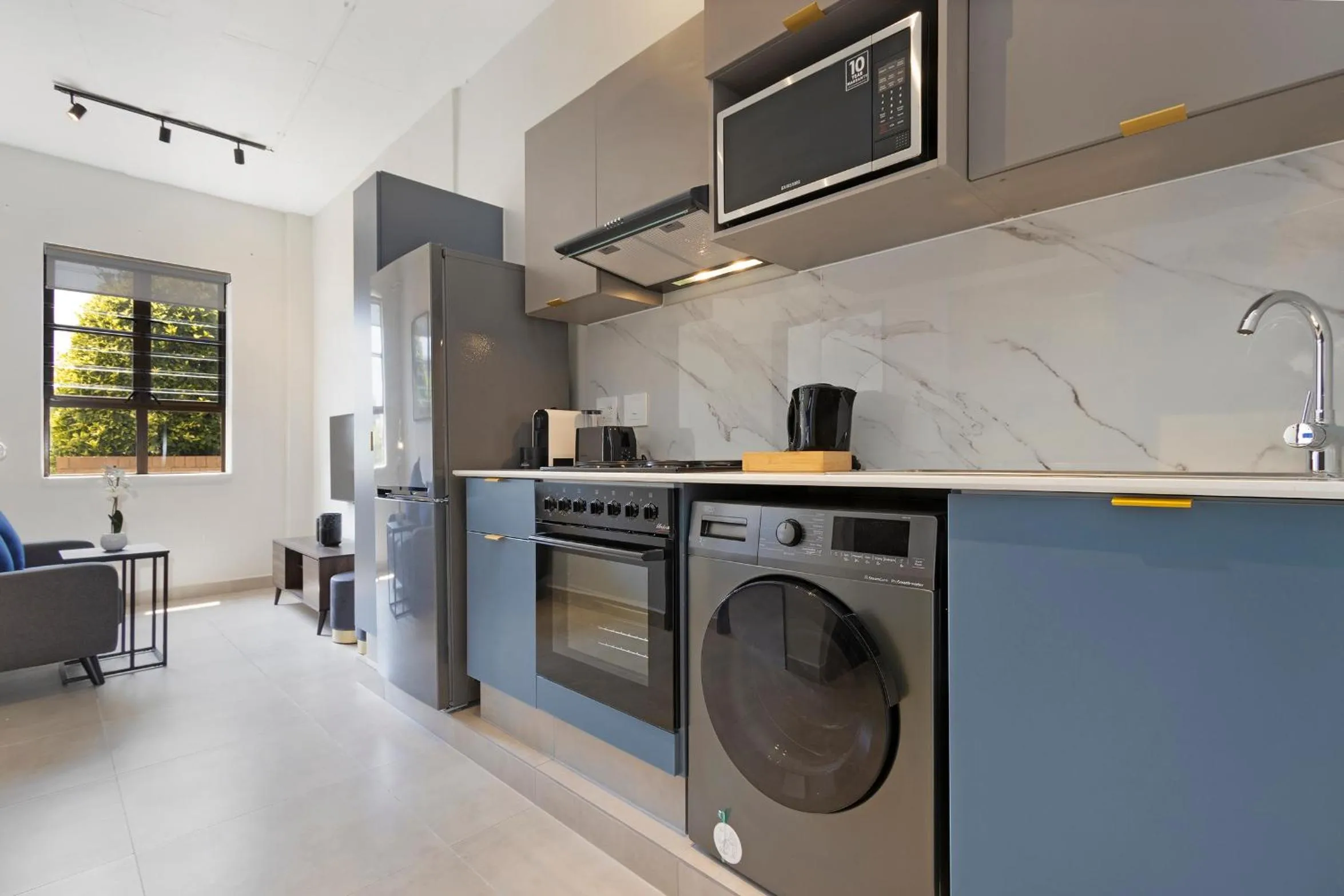 Kitchen or kitchenette in The Archer Aparthotel by Totalstay