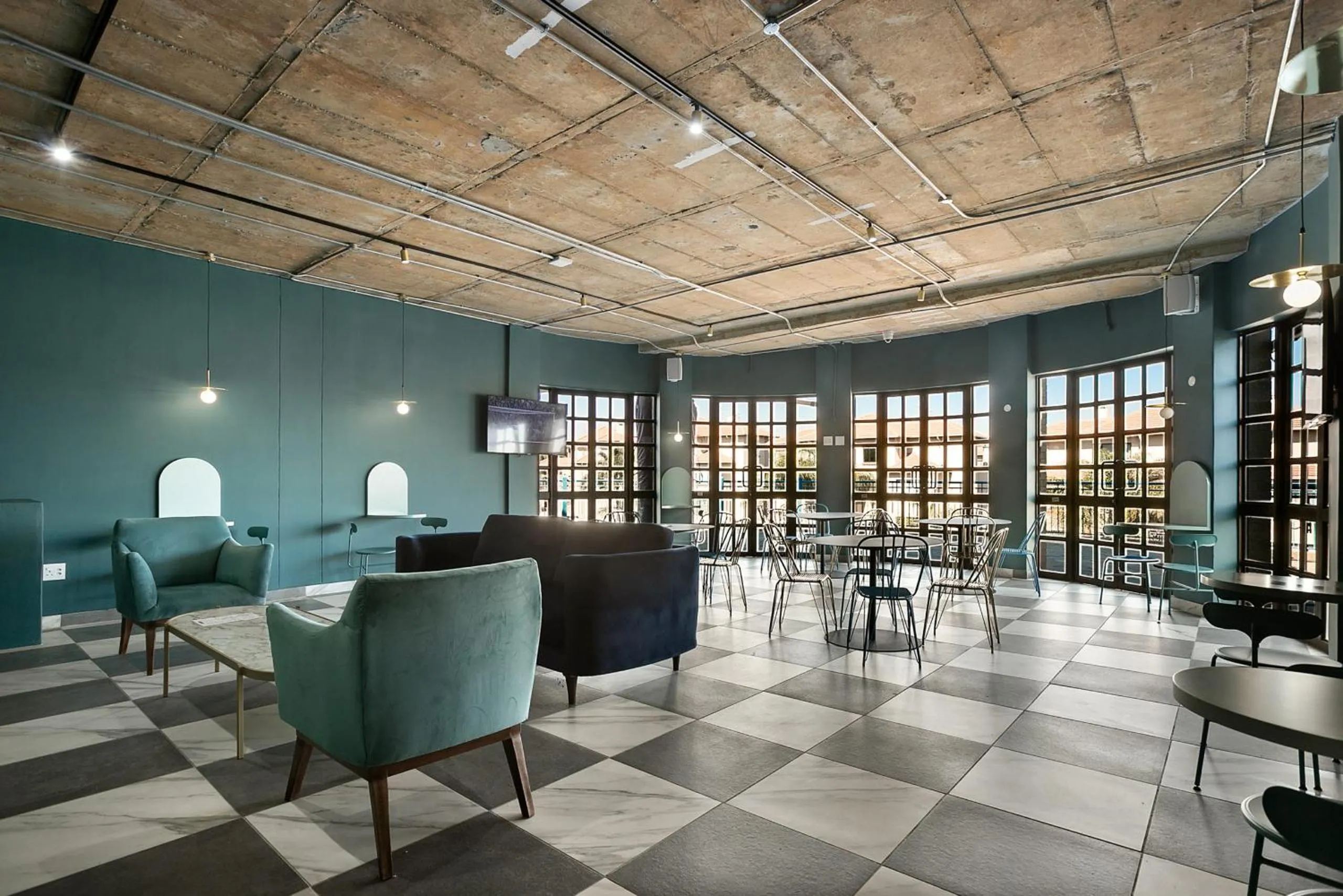 Lounge or bar in The Archer Aparthotel by Totalstay