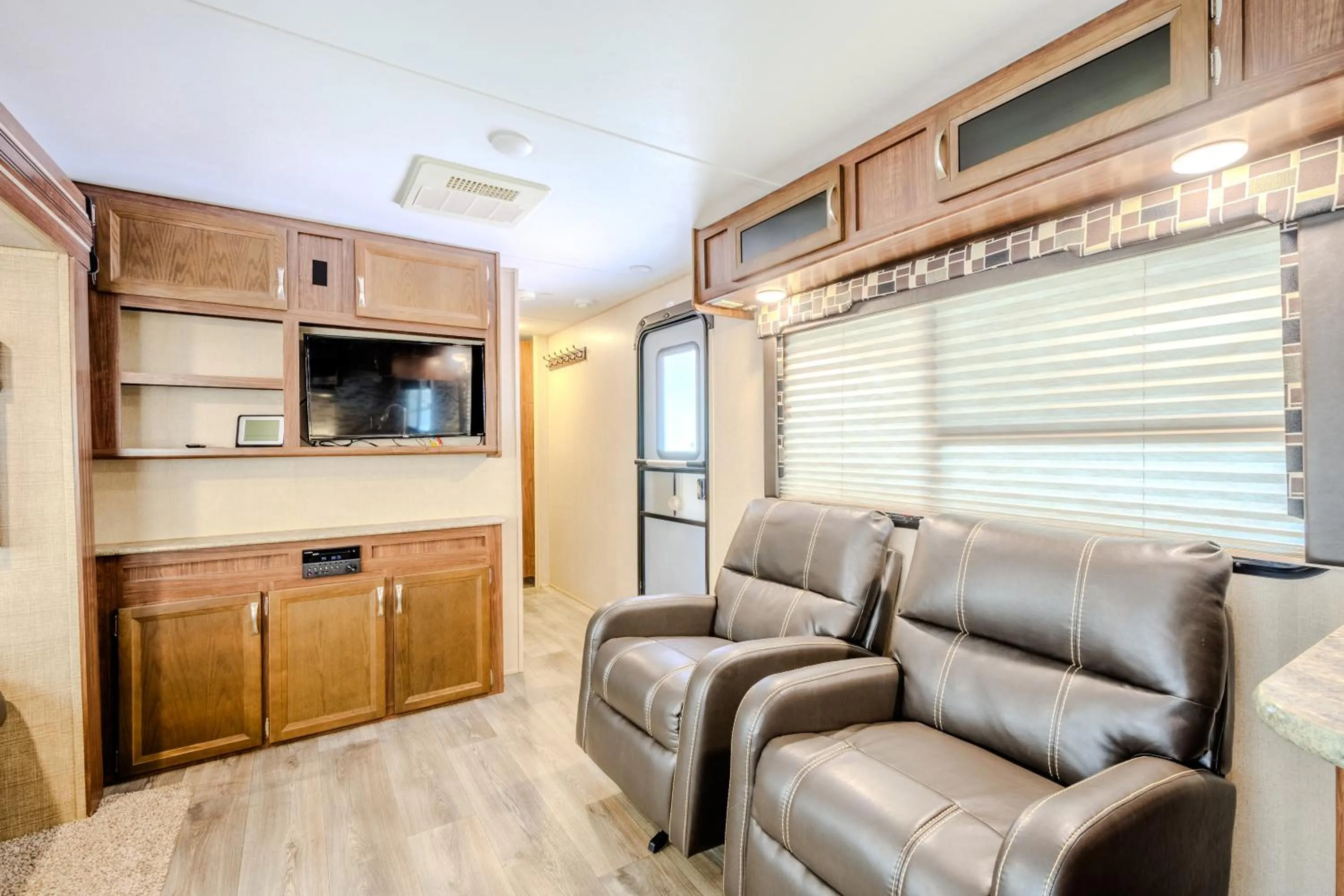 Communal lounge/ TV room in West Coast Inn's