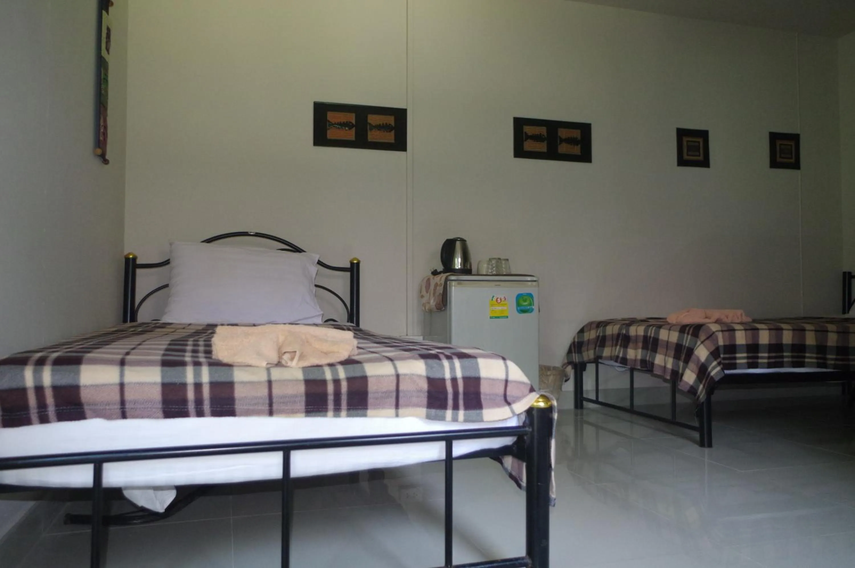 Bed in Thai House Beach Resort