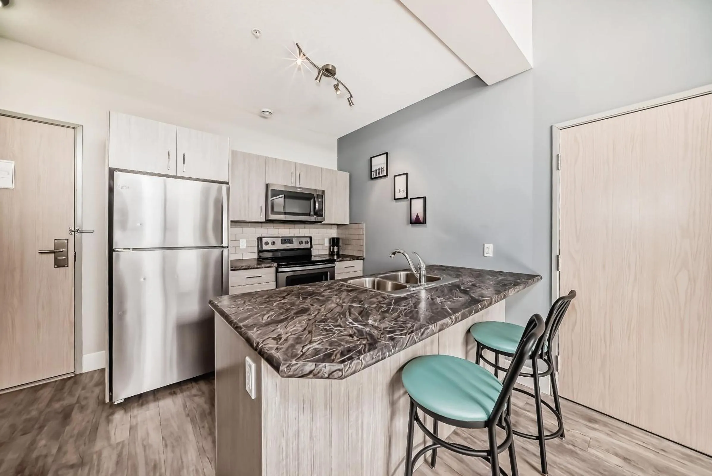 kitchen in The Suites, INN Hotels