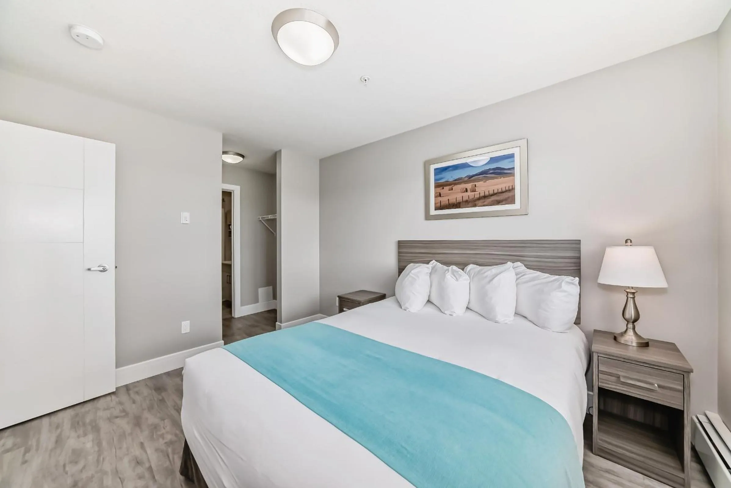 Bed in The Suites, INN Hotels