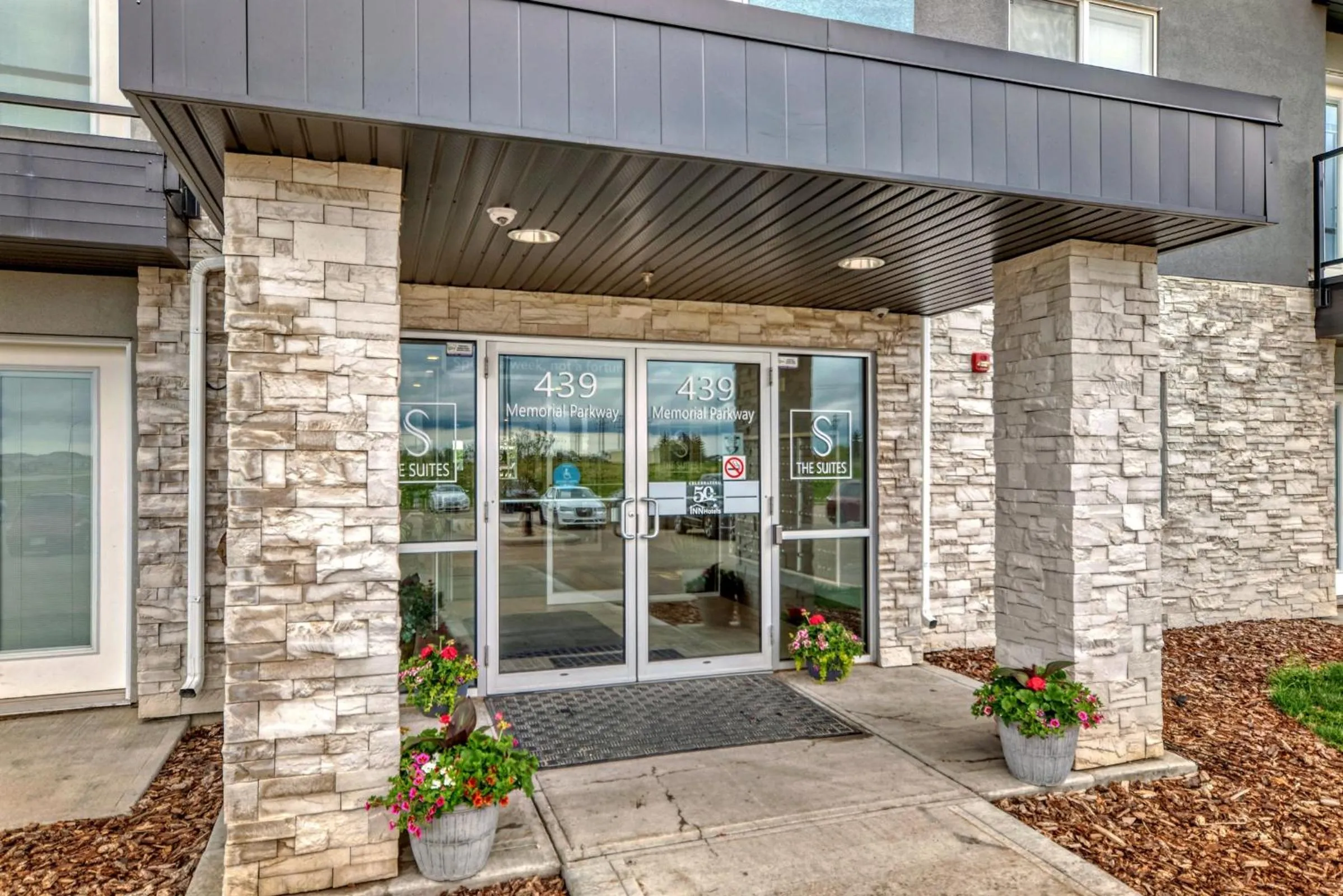 Property building in The Suites, INN Hotels