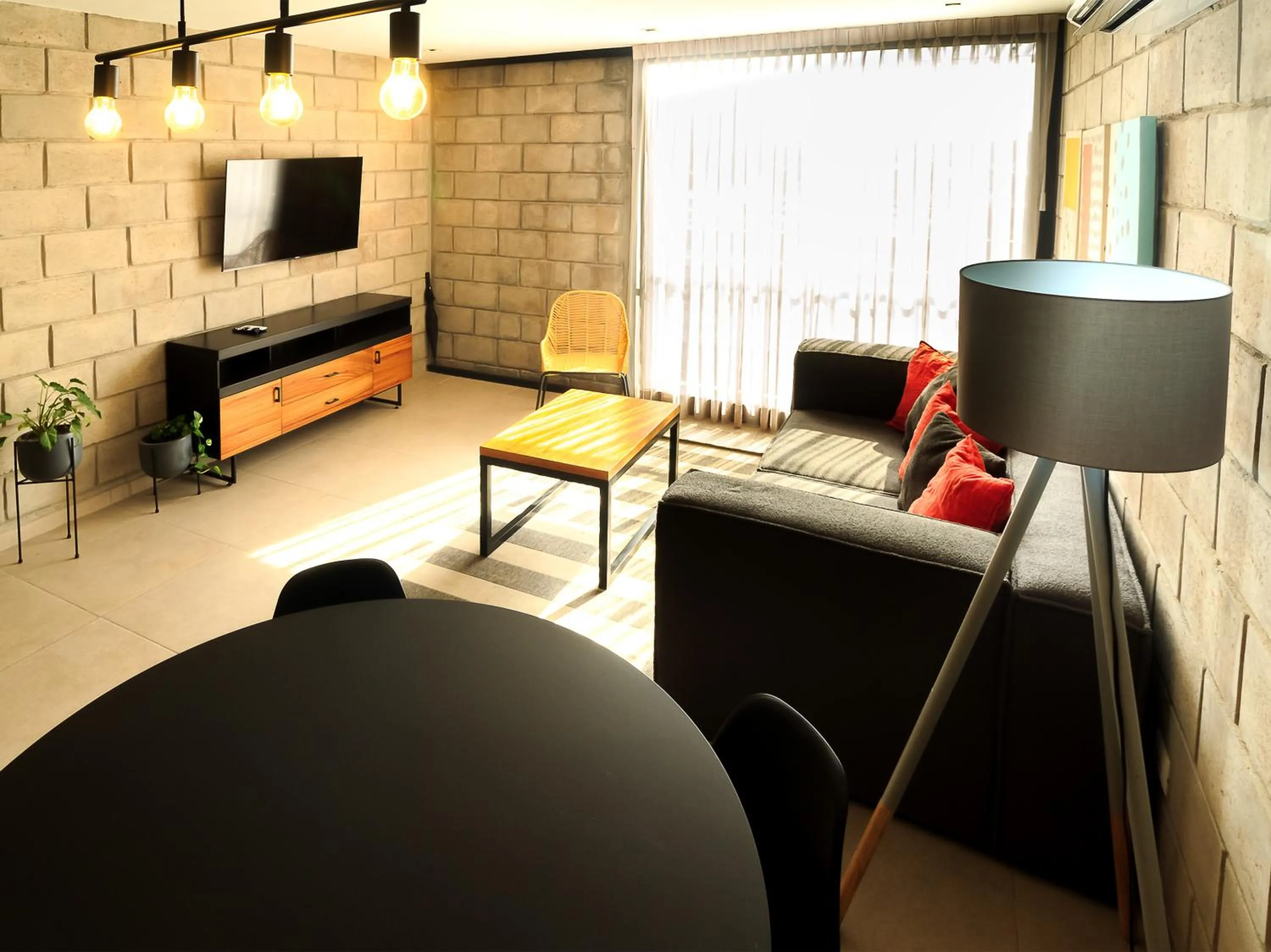 Communal lounge/ TV room in Tribu Centro Histórico