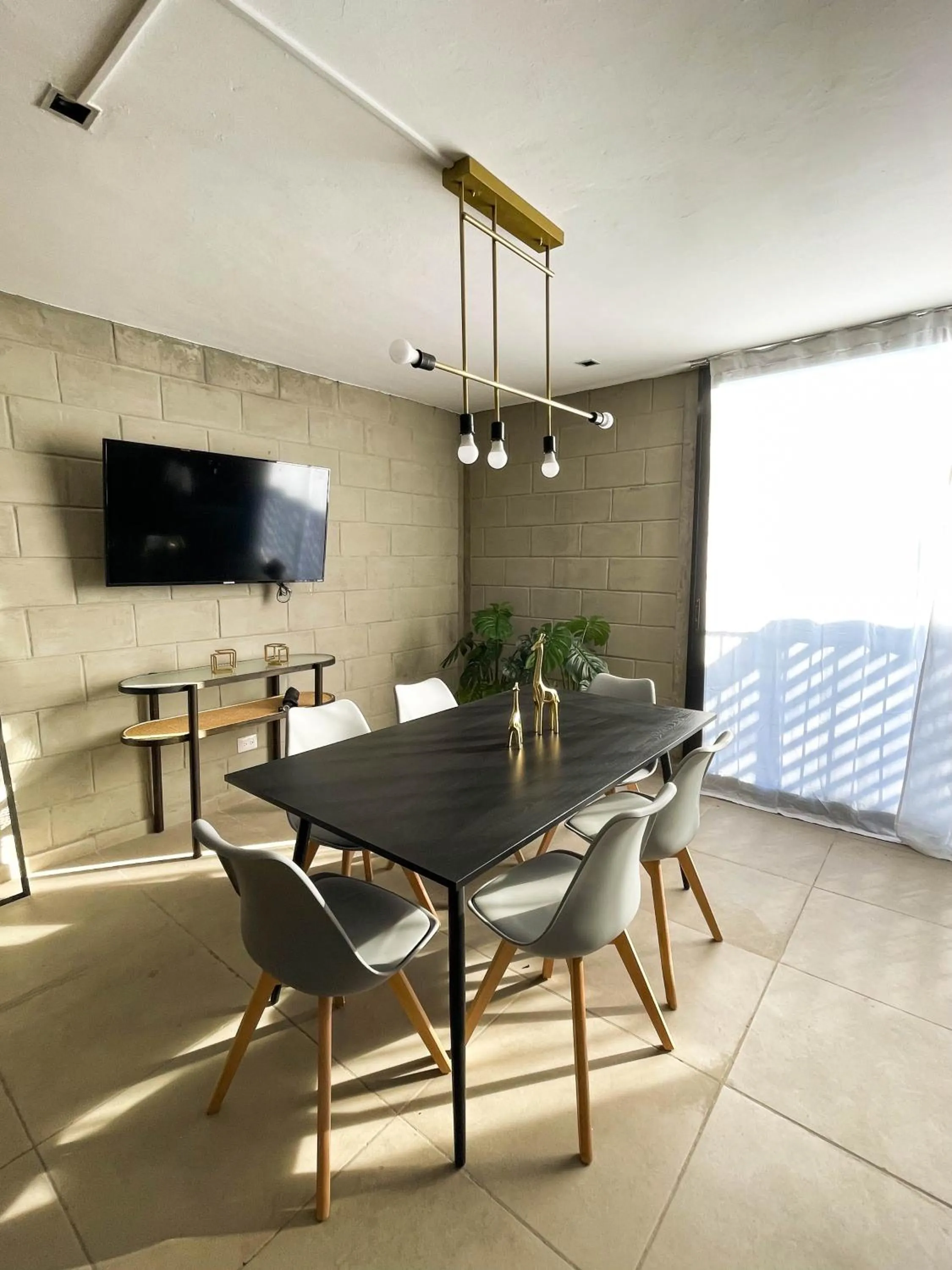 Communal lounge/ TV room in Tribu Centro Histórico