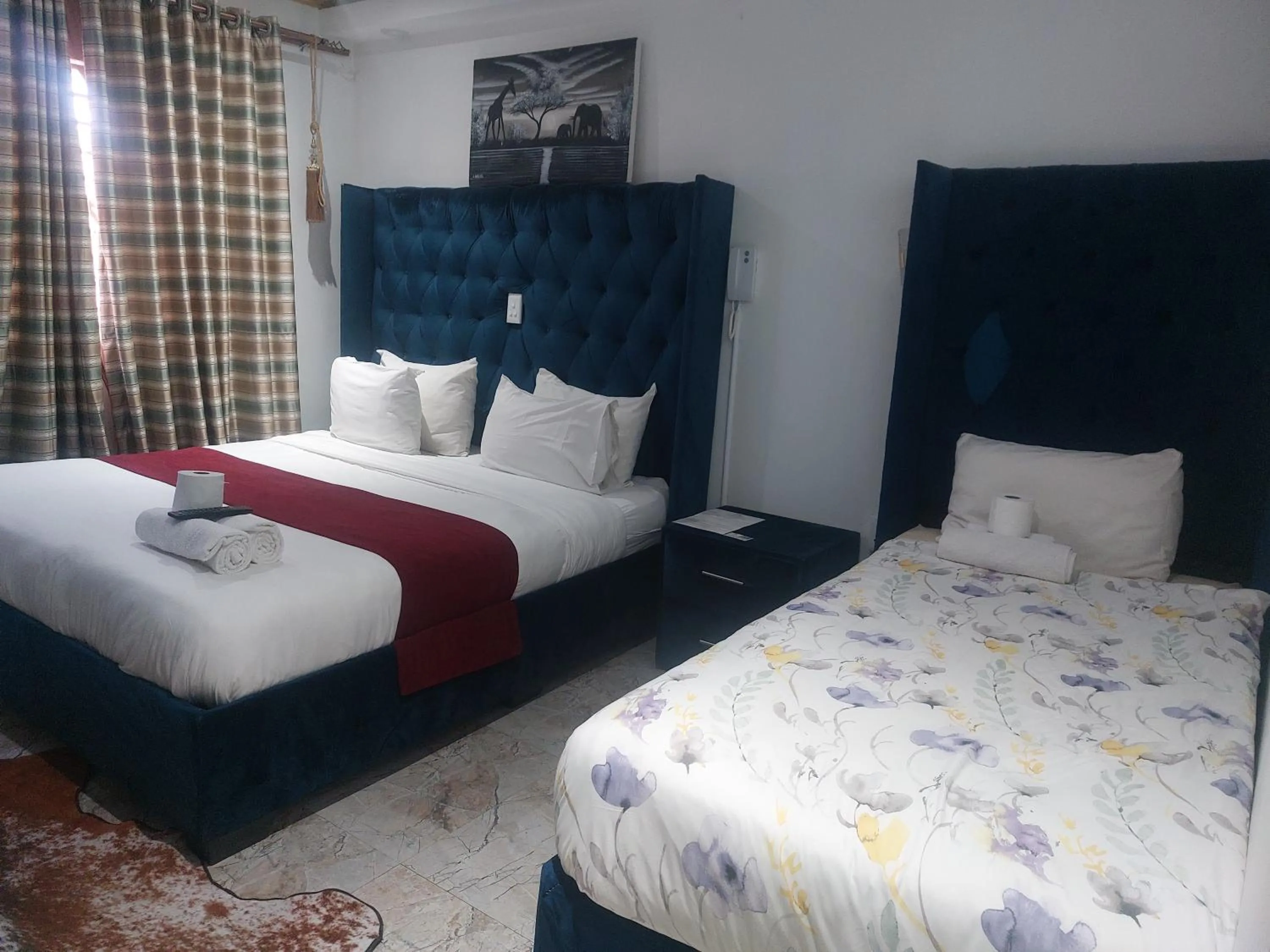 Bed in Gold Crown International Hotel Johannesburg