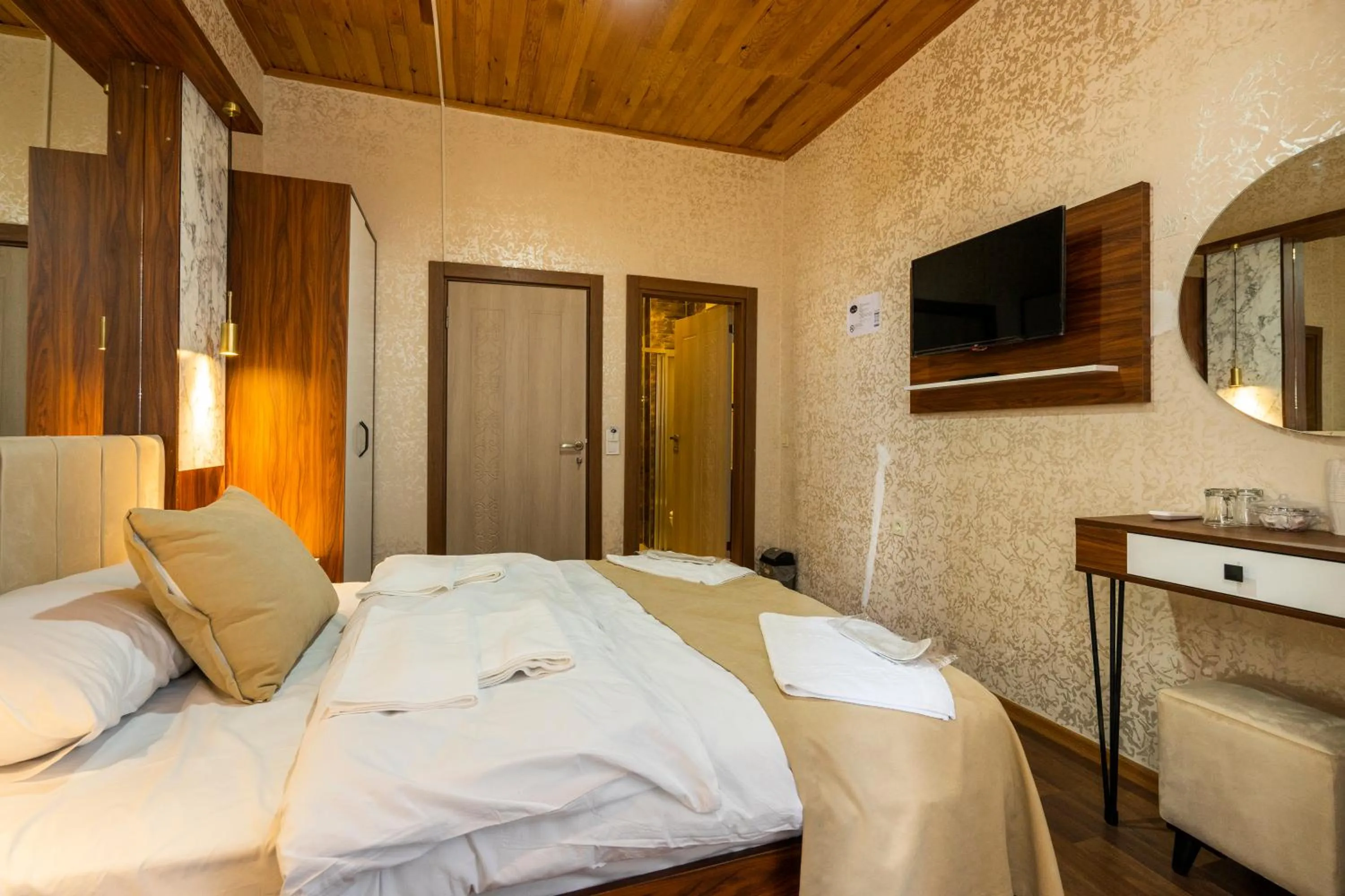 Communal lounge/ TV room, Bed in Candy Hotel