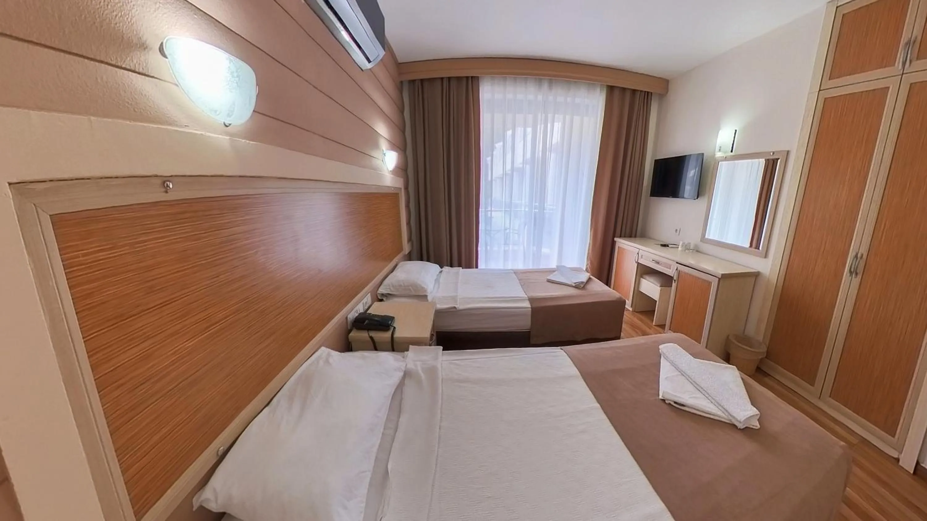 Bed in Mr Crane Hotel