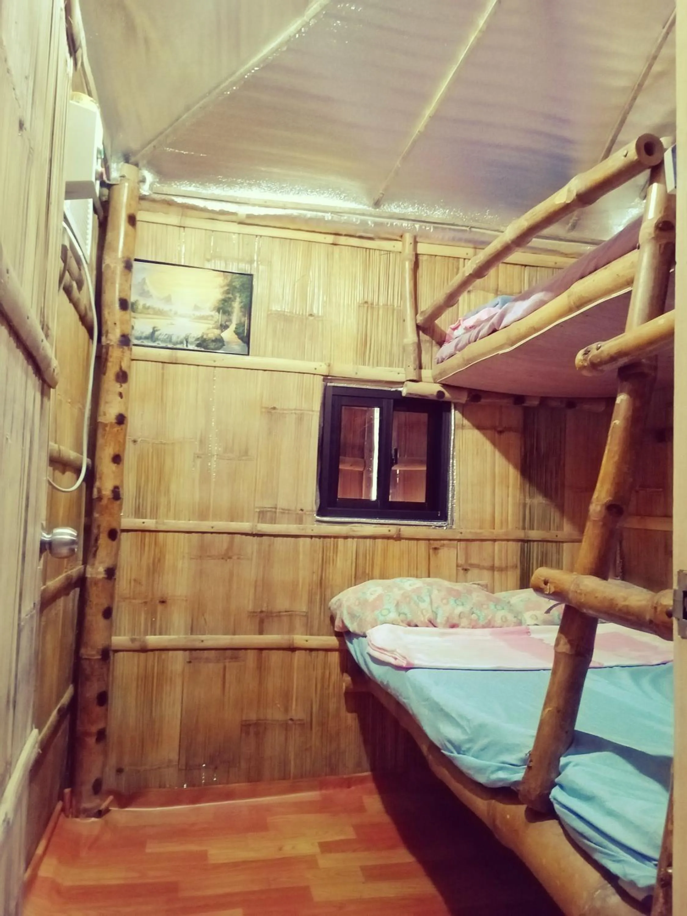 air conditioner, Bed in D Sanctum Resort