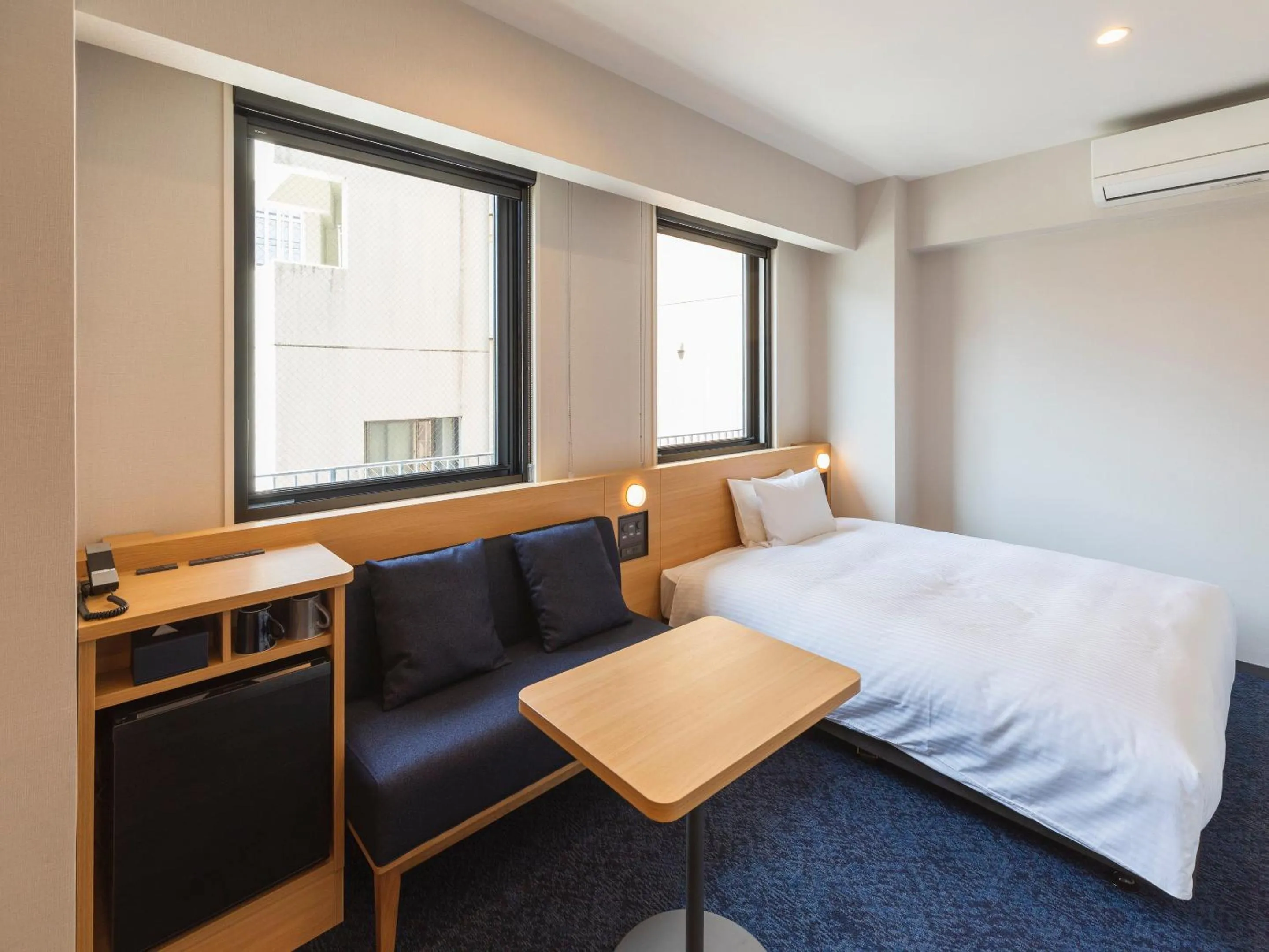 Bed in Sotetsu Fresa Inn Sendai