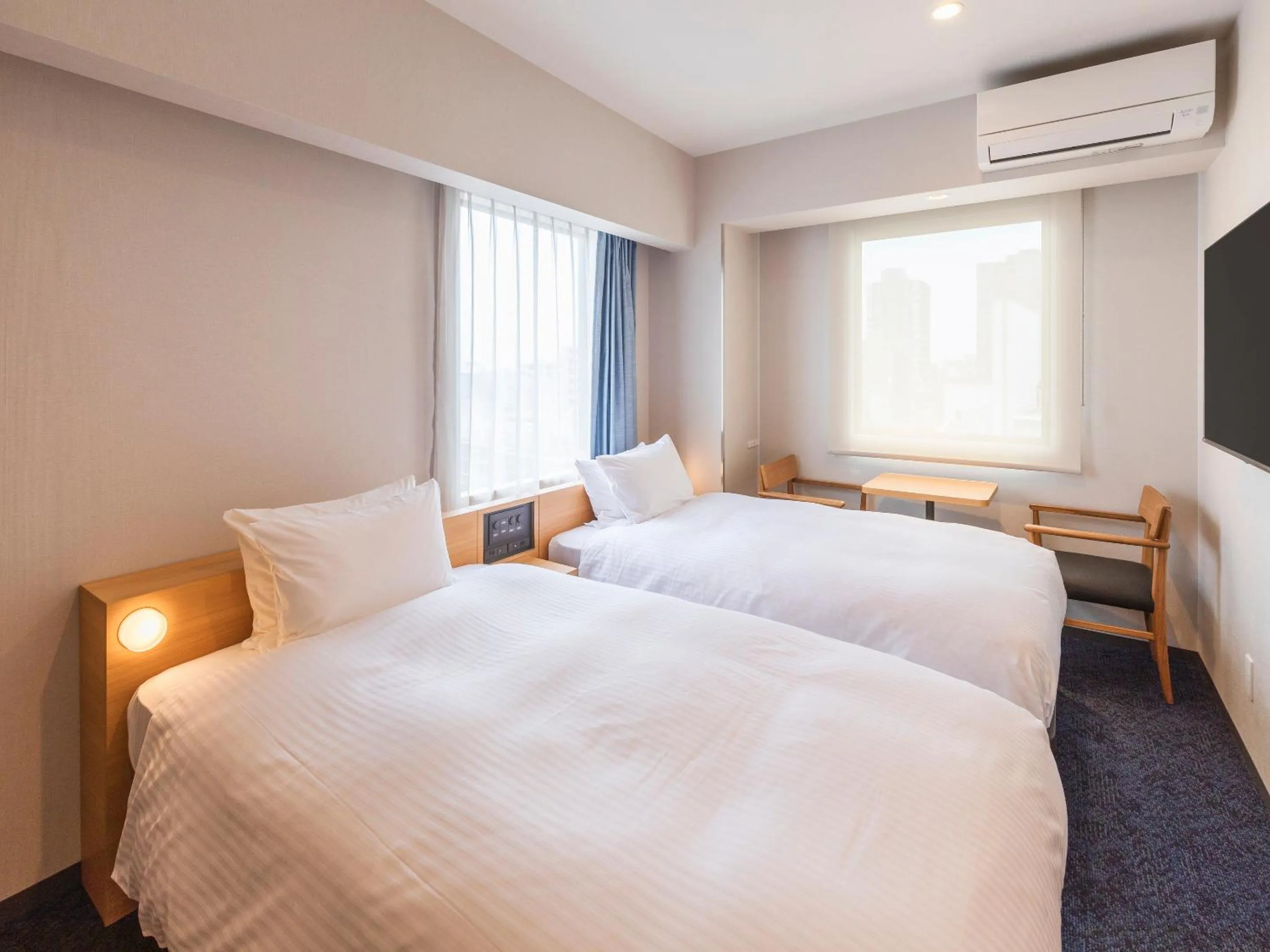 Bed in Sotetsu Fresa Inn Sendai