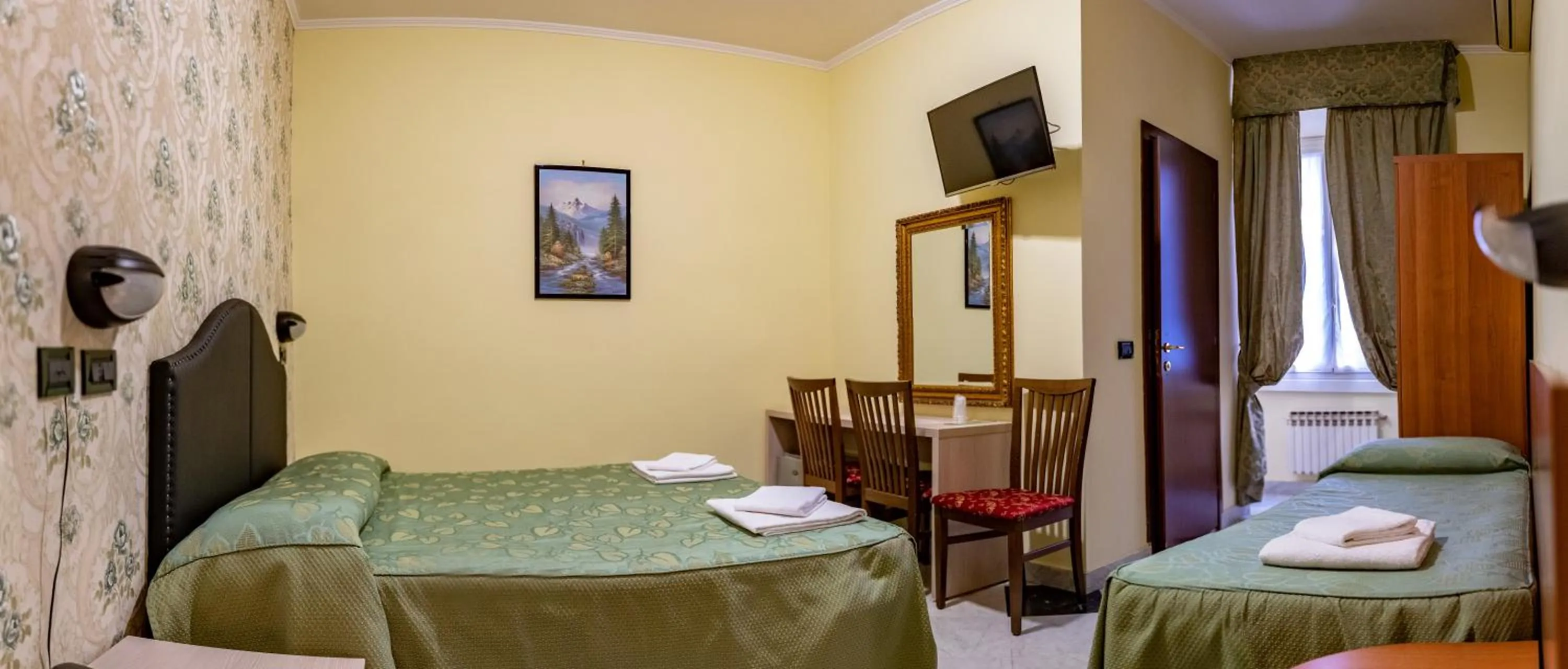 Bed in Hotel Ferrarese