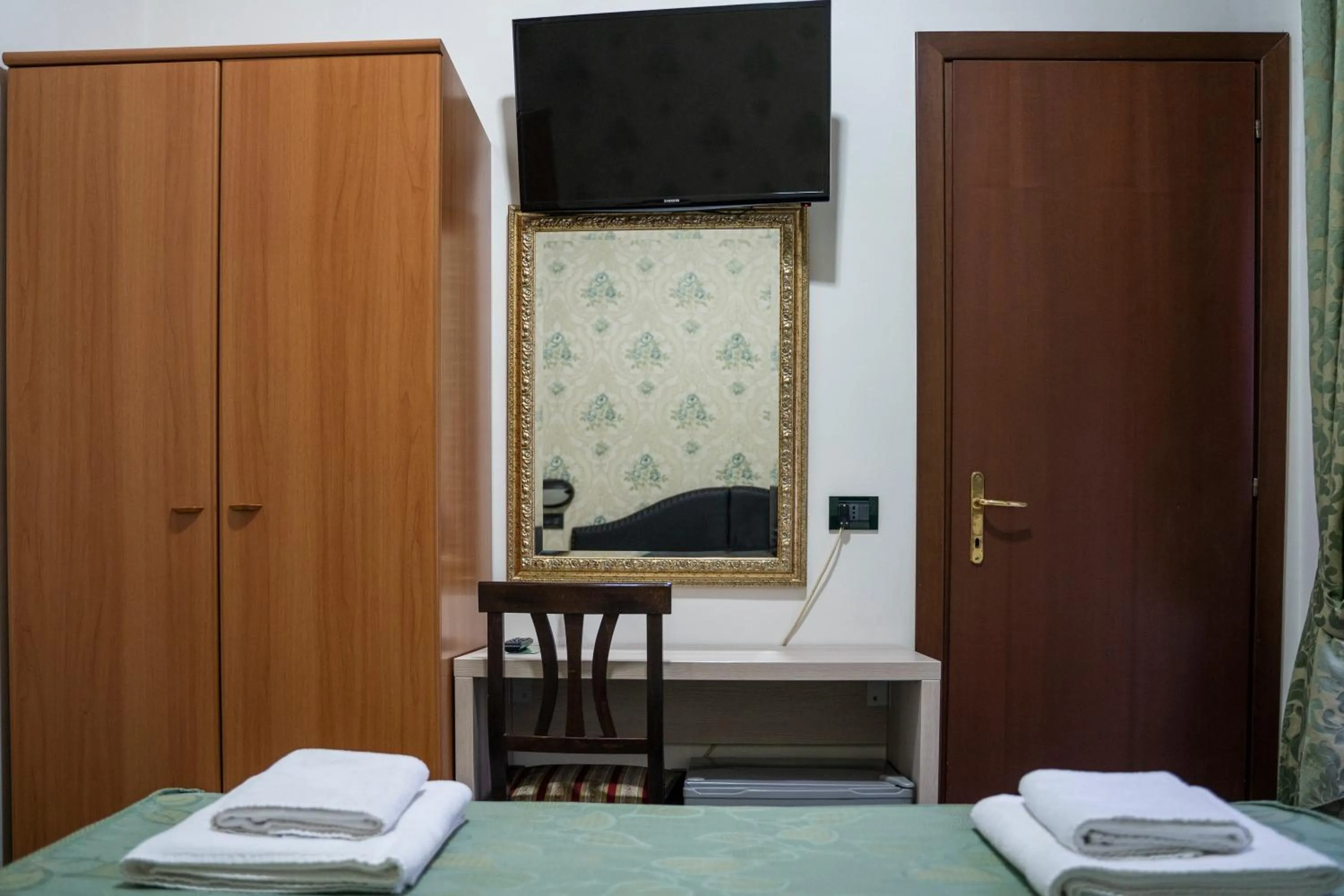 Bed in Hotel Ferrarese