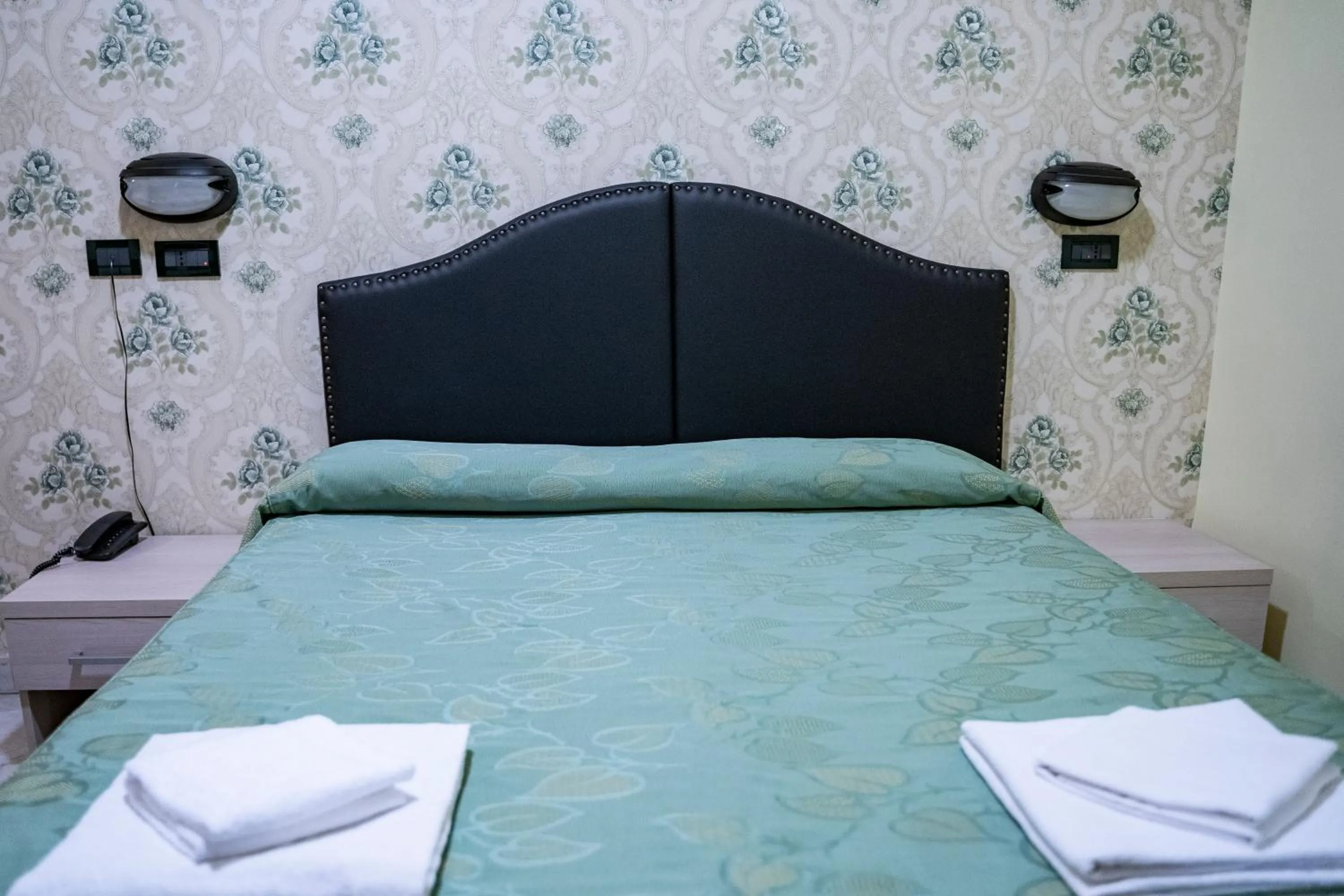Bed in Hotel Ferrarese