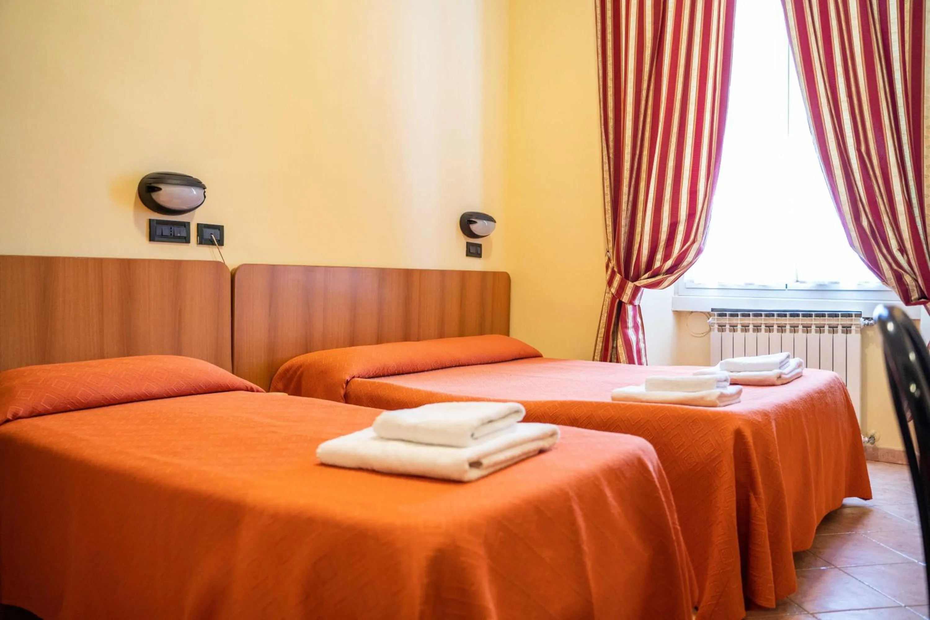 Bed in Hotel Ferrarese