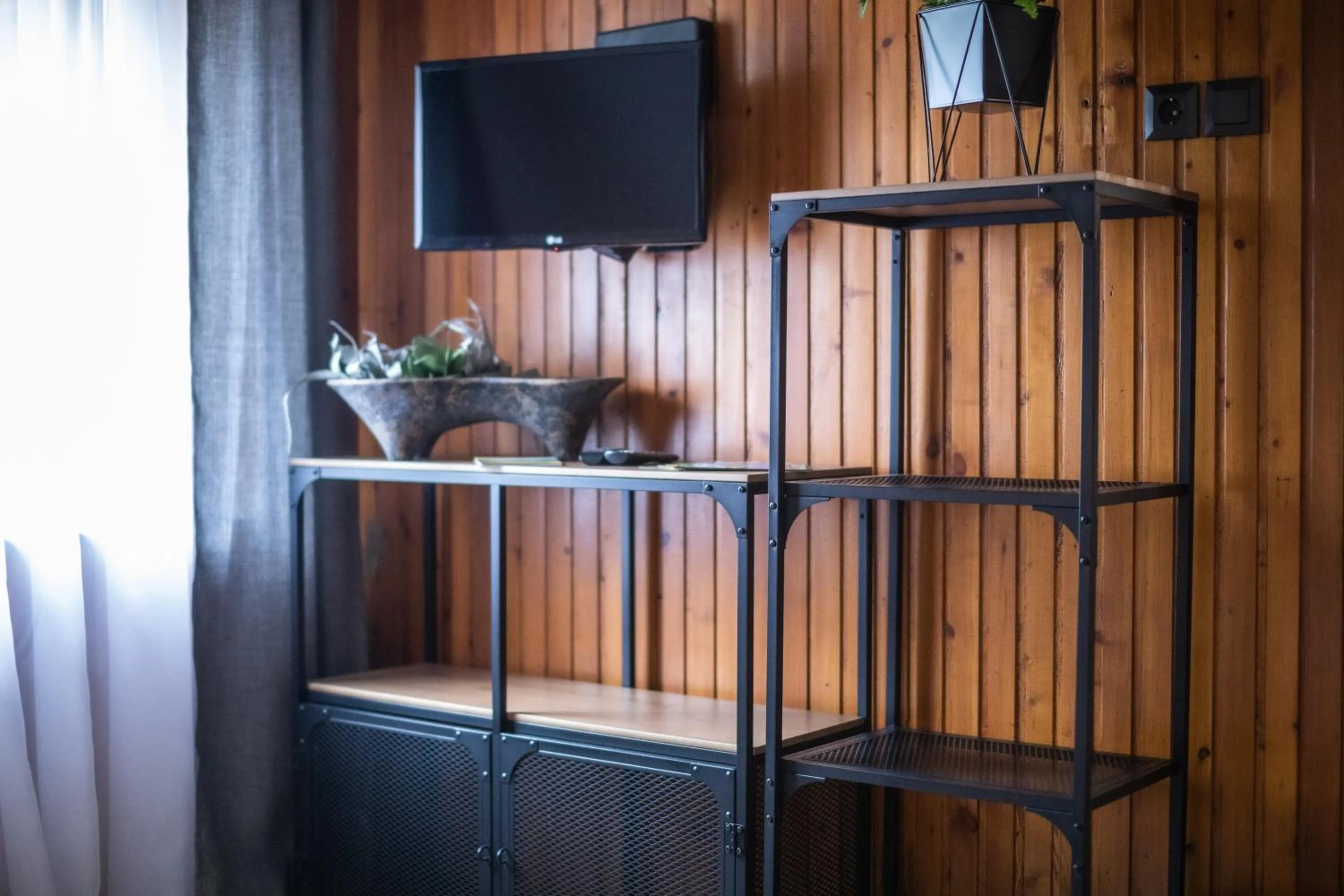 Communal lounge/ TV room in 4 Évszak Völgyhotel