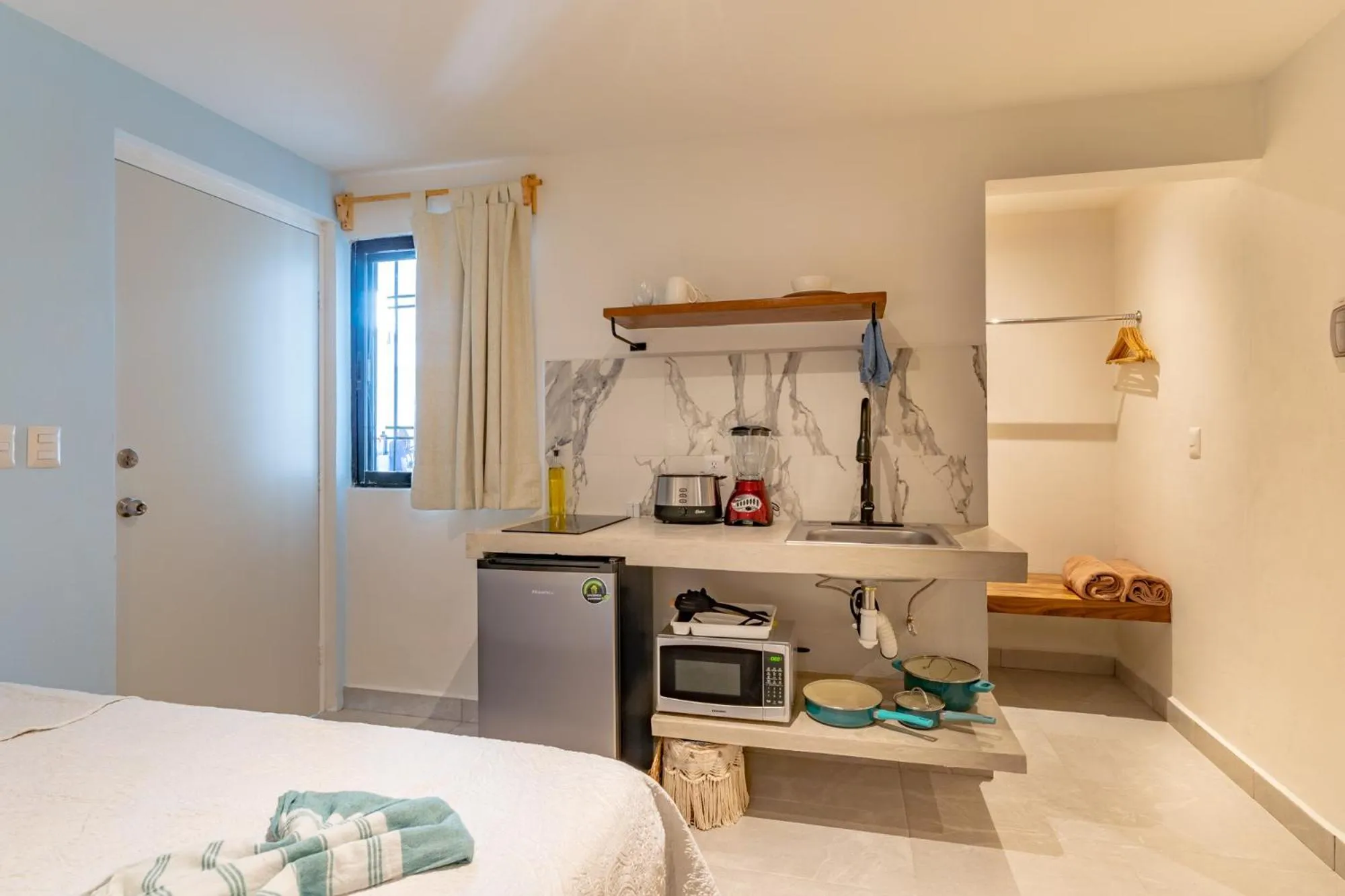 Kitchen or kitchenette, Bed in Casa Yako