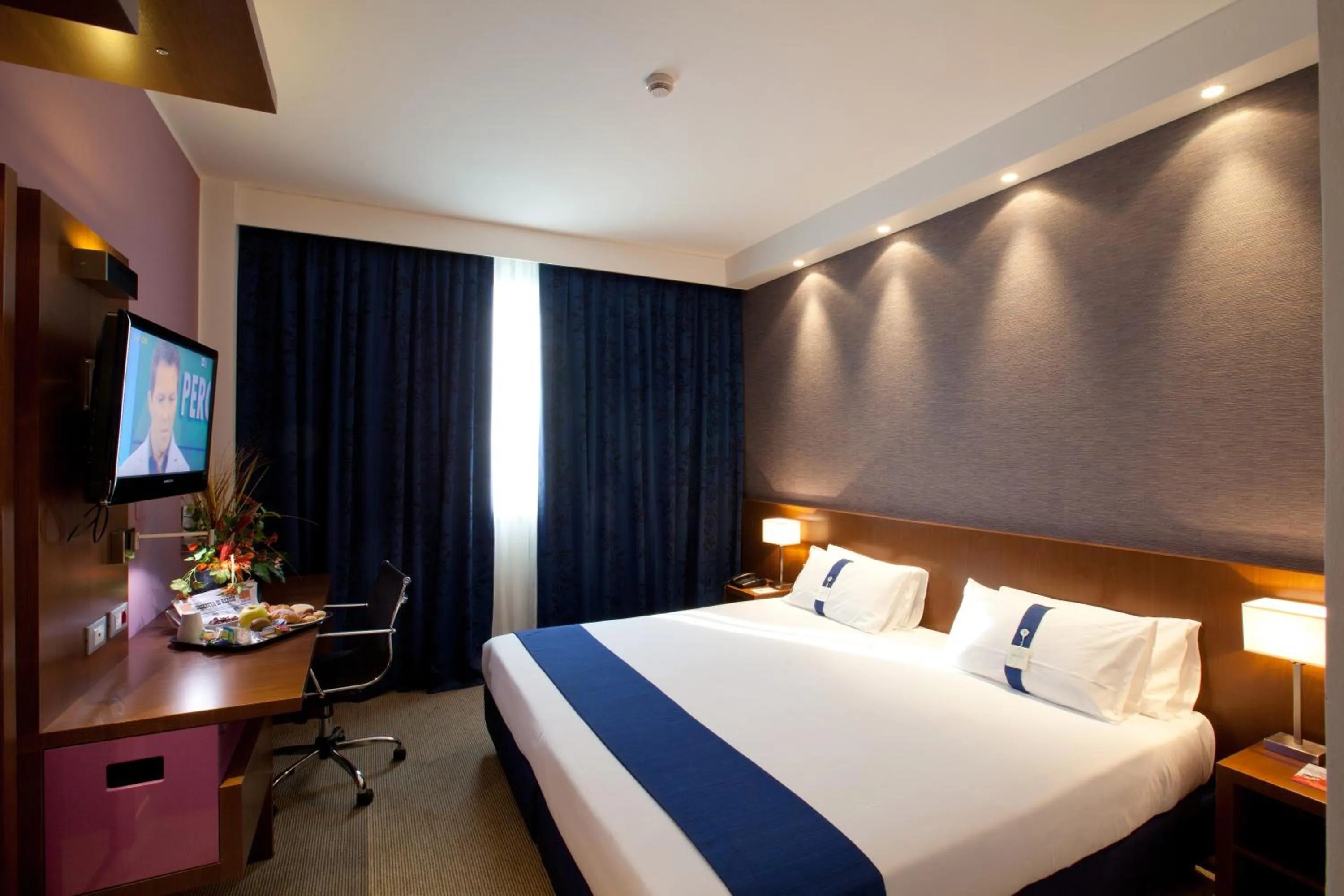 Bed in Holiday Inn Express Reggio Emilia by IHG
