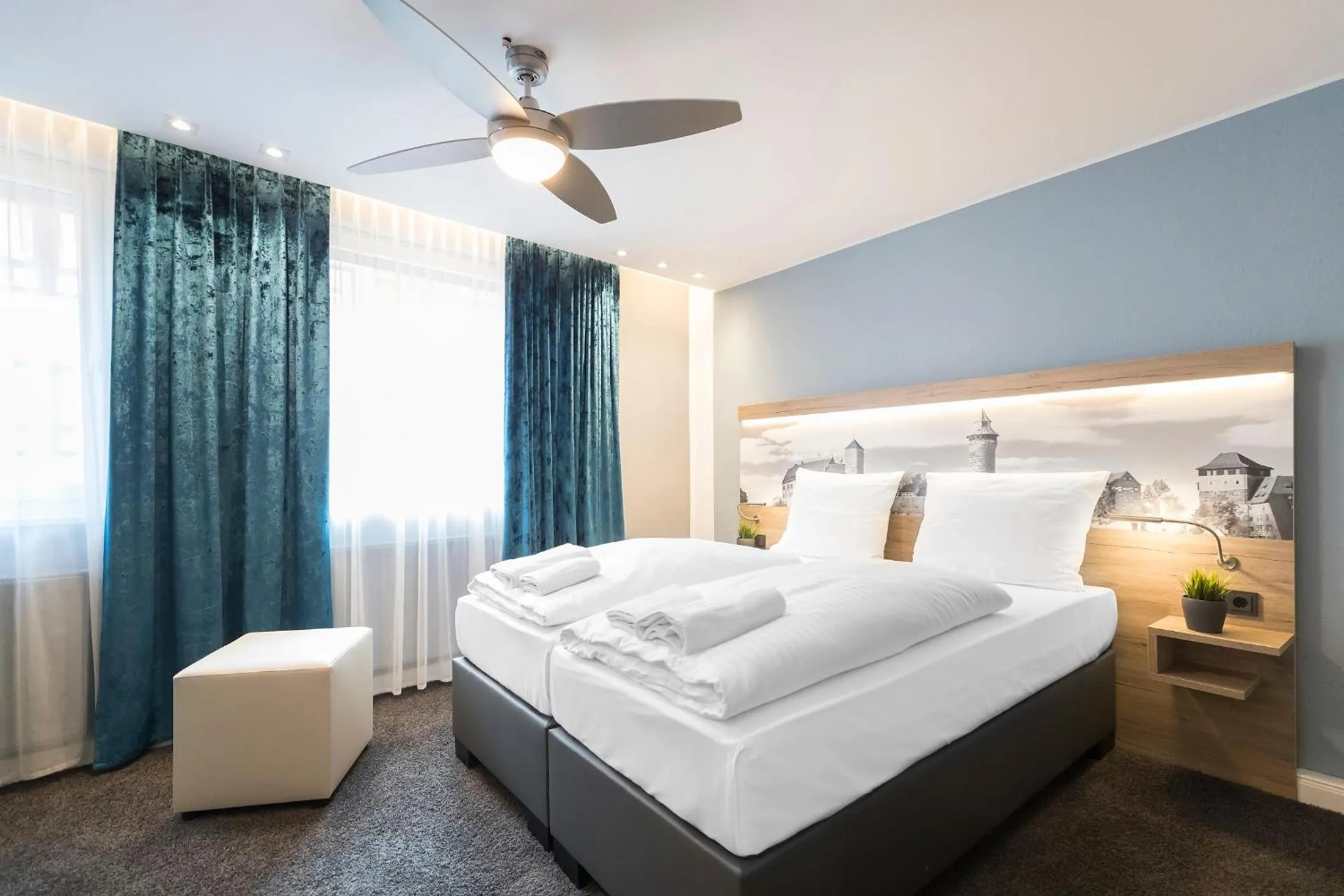 Photo of the whole room, Bed in Riverview Apartments by dasPaul