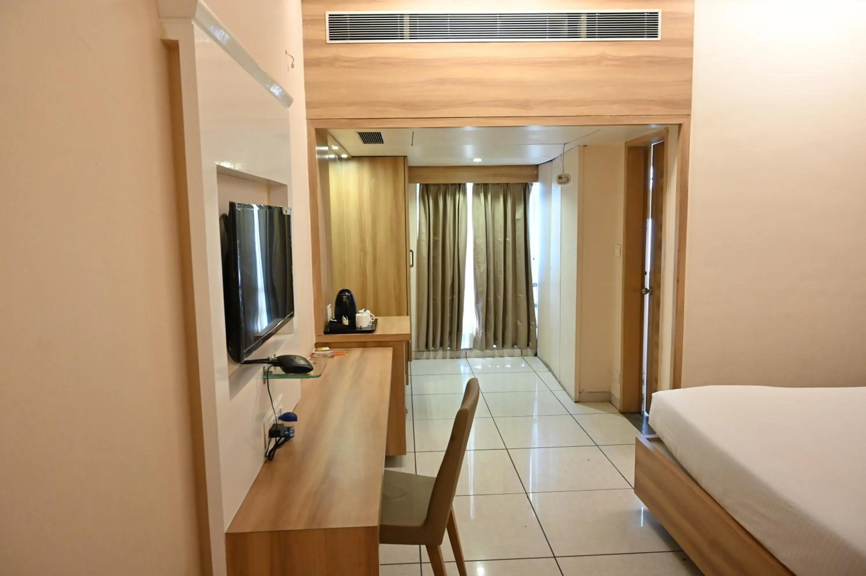 View (from property/room), Bed in Rang Lords Inn Bharuch