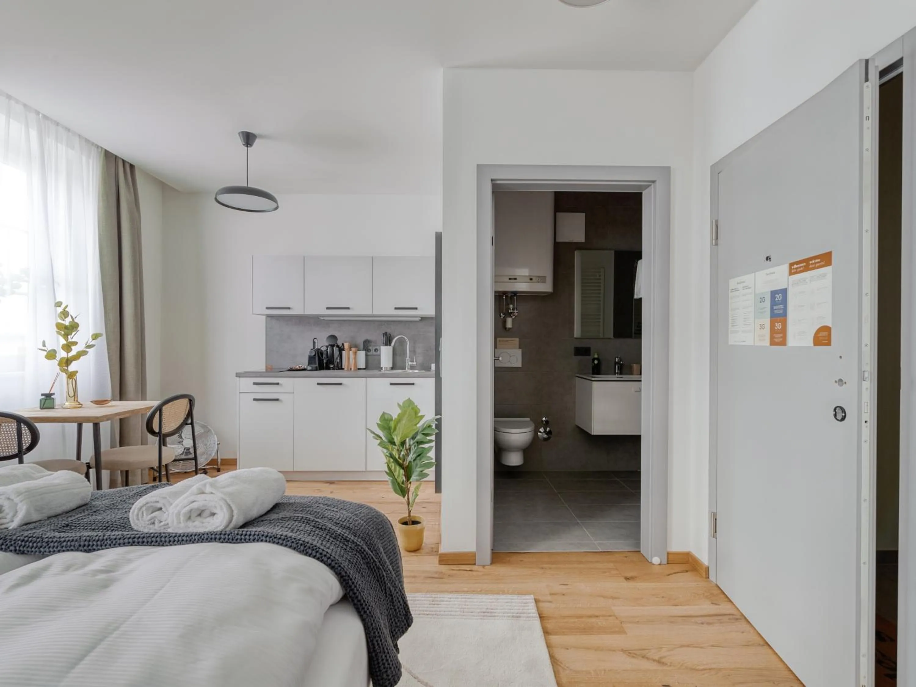Kitchen or kitchenette, Bed in Limehome Villach Gerbergasse
