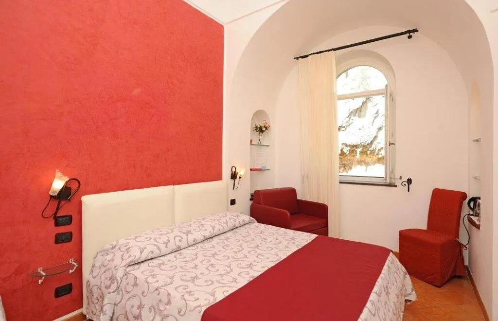 Bed in Hotel Relais Villa Annalara