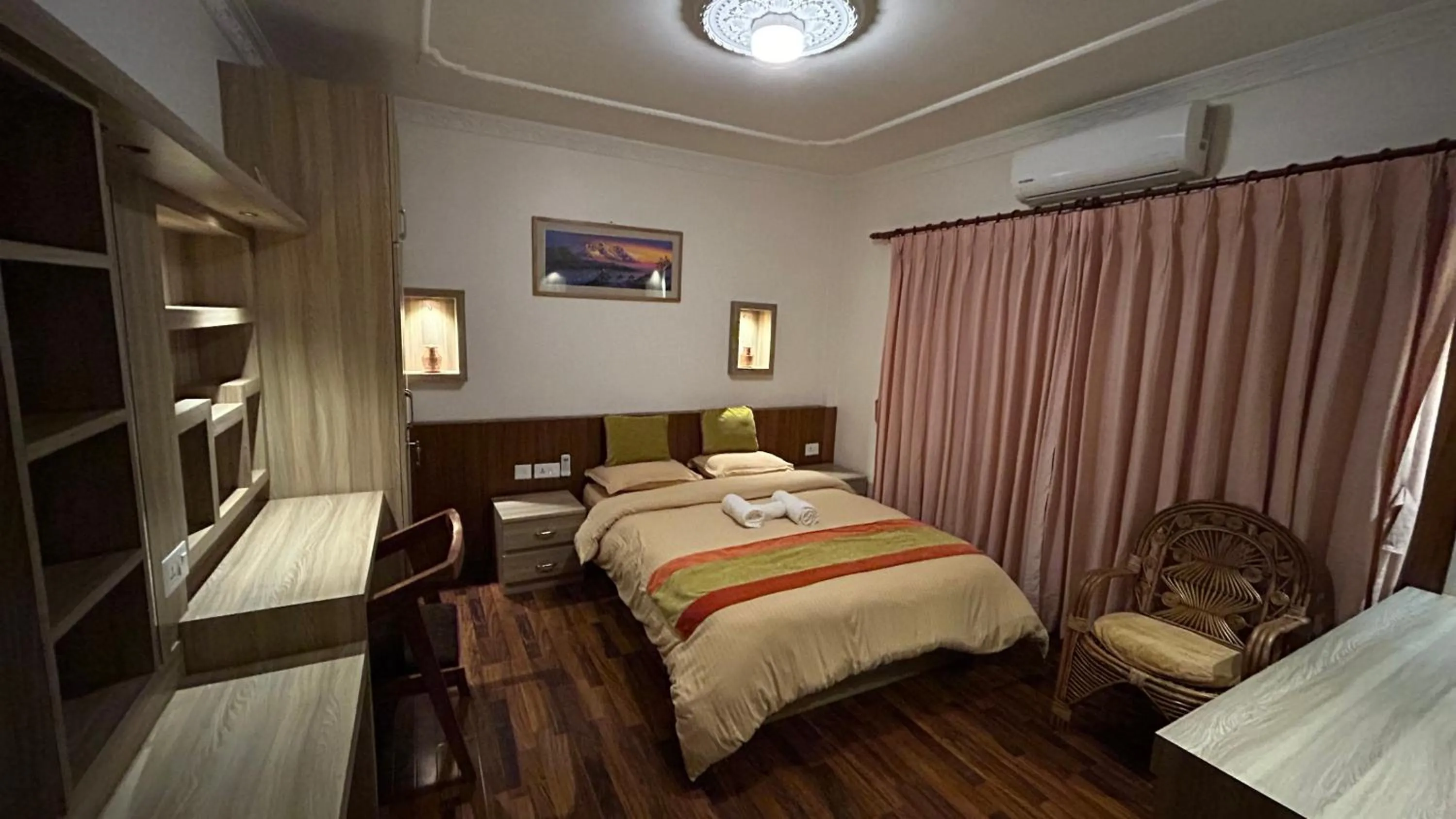Bedroom, Bed in Raniban Suites - Apartment Home