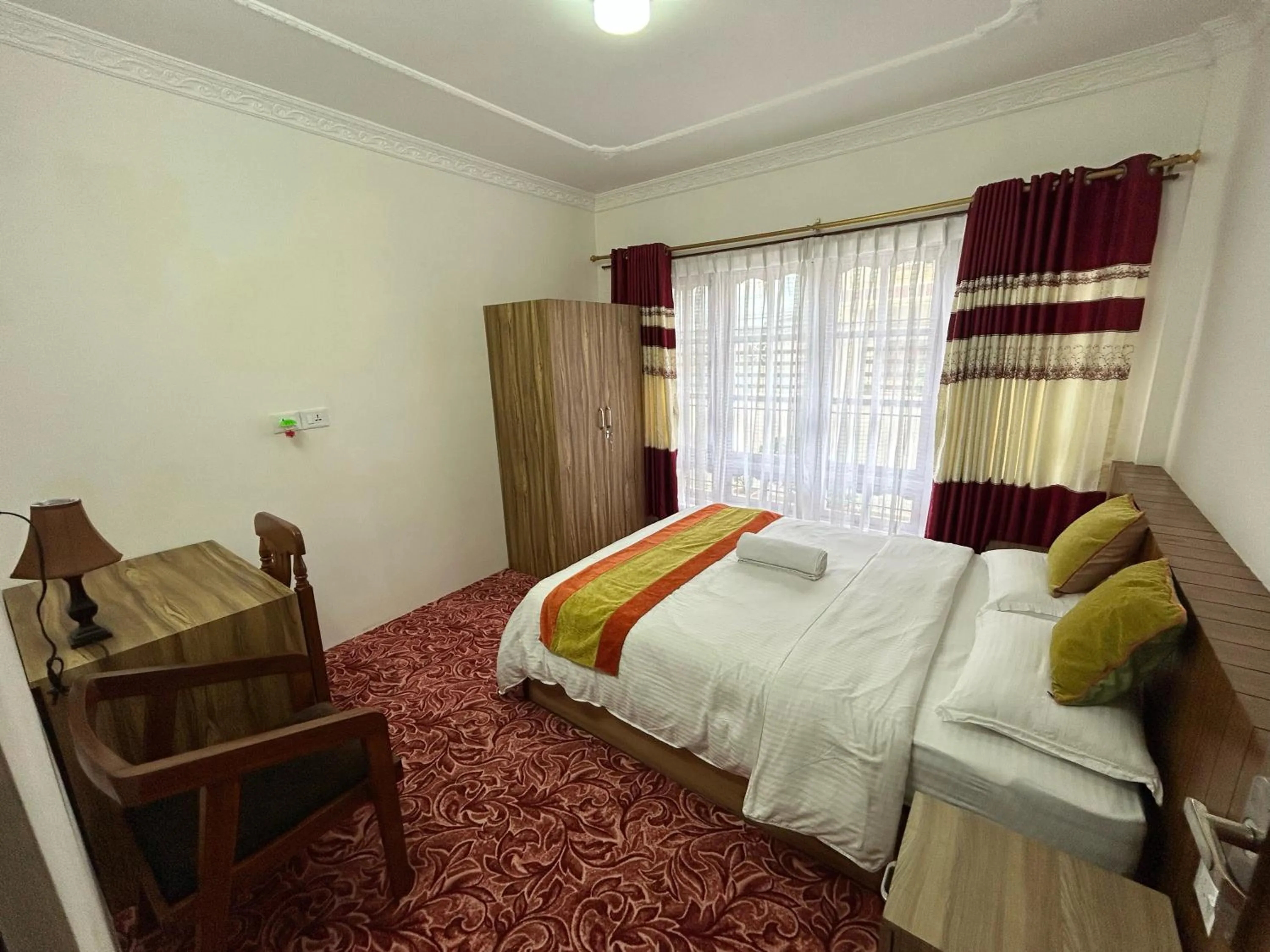 Bedroom, Bed in Raniban Suites - Apartment Home