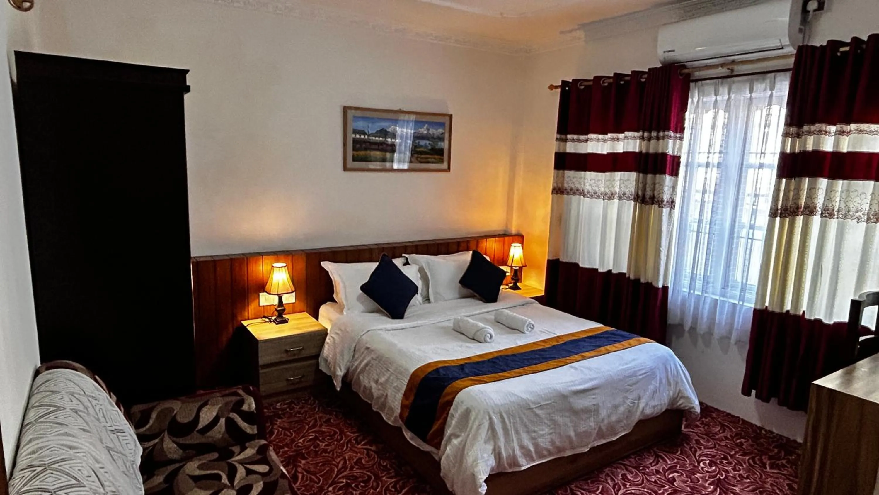 Bedroom, Bed in Raniban Suites - Apartment Home