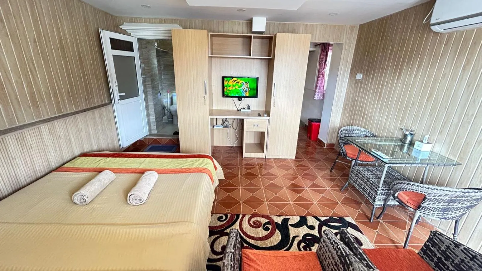 Bedroom, Bed in Raniban Suites - Apartment Home