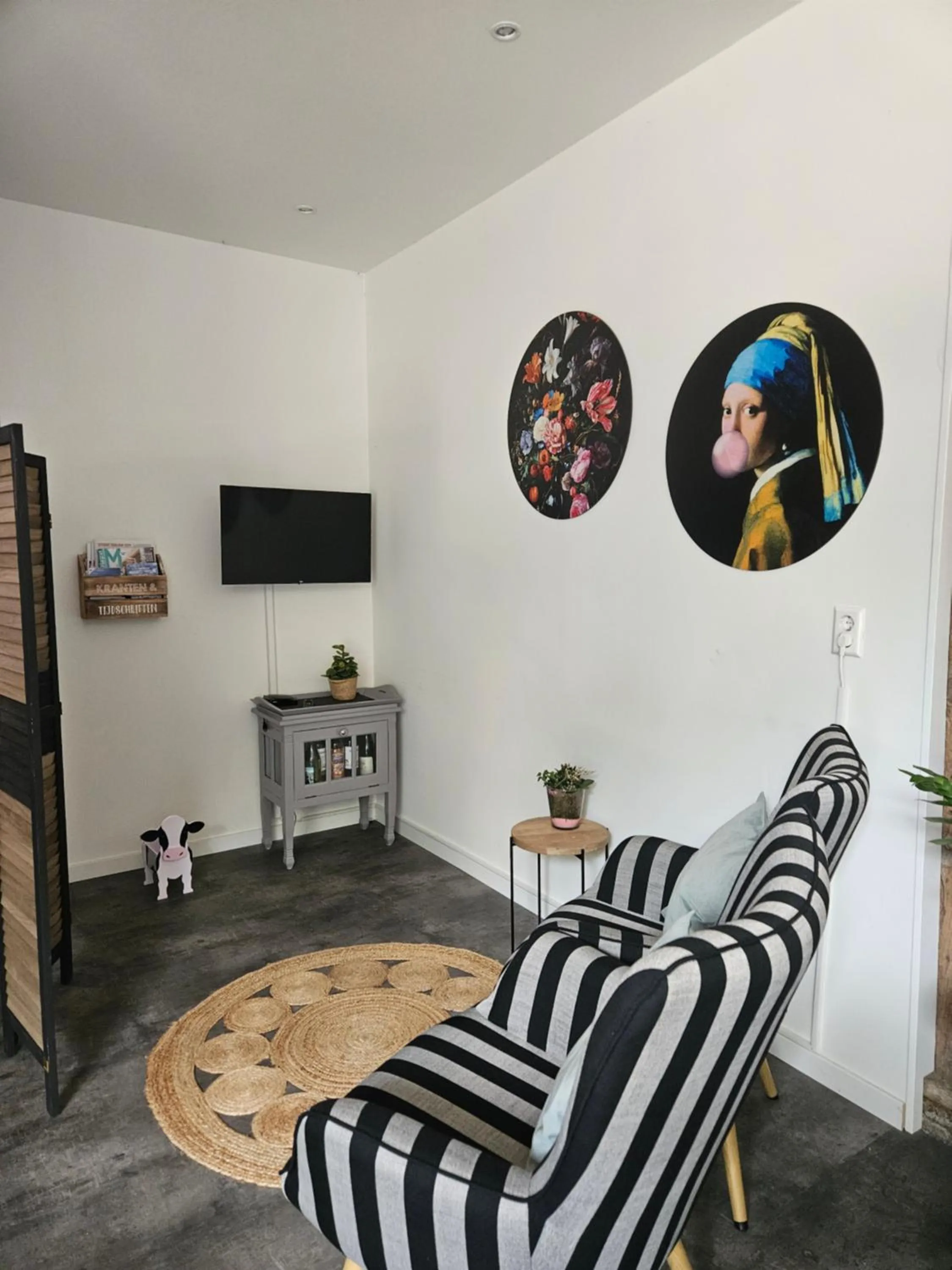 Communal lounge/ TV room in B&B Wijdzicht