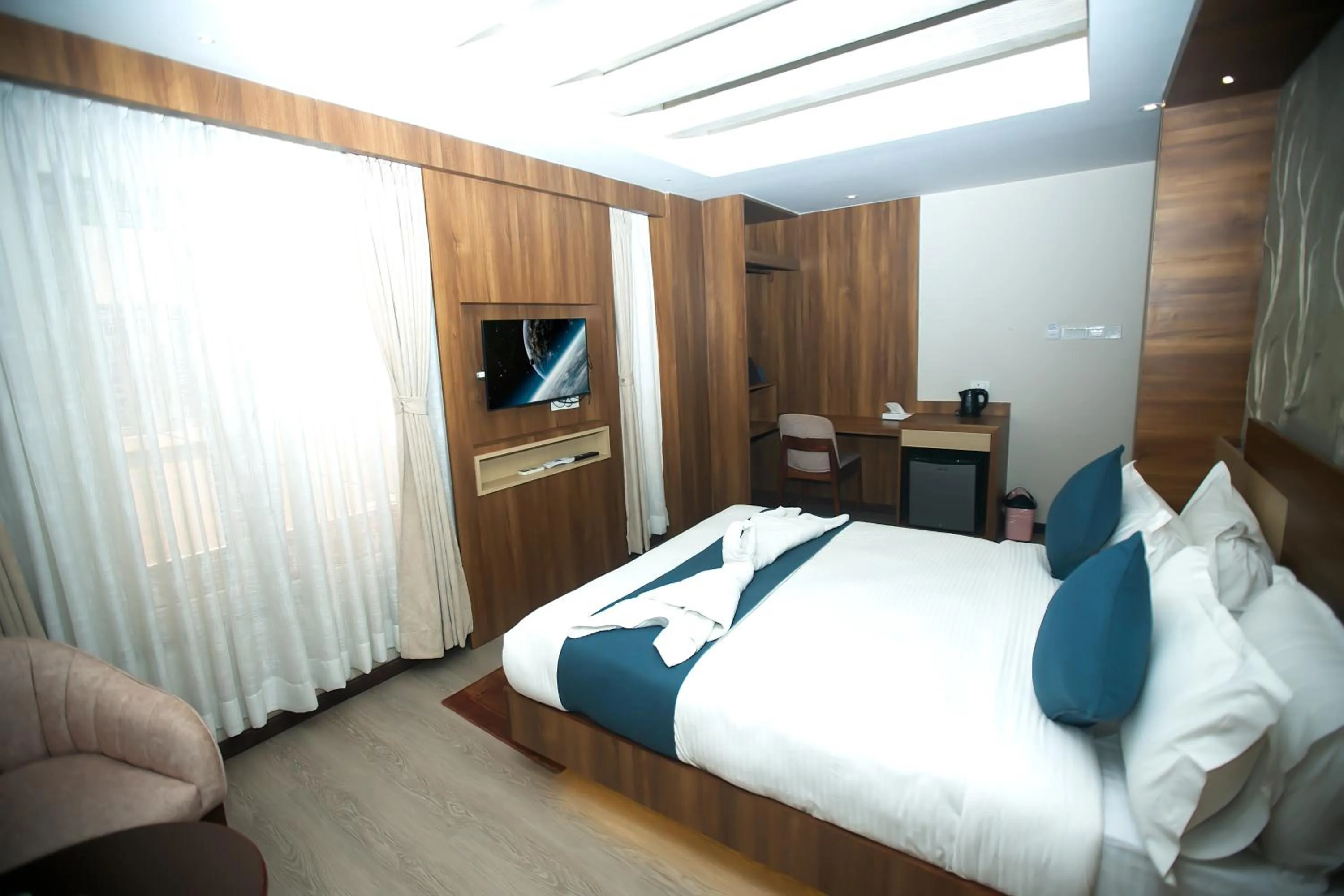 Bed in Maya Boutique Hotel