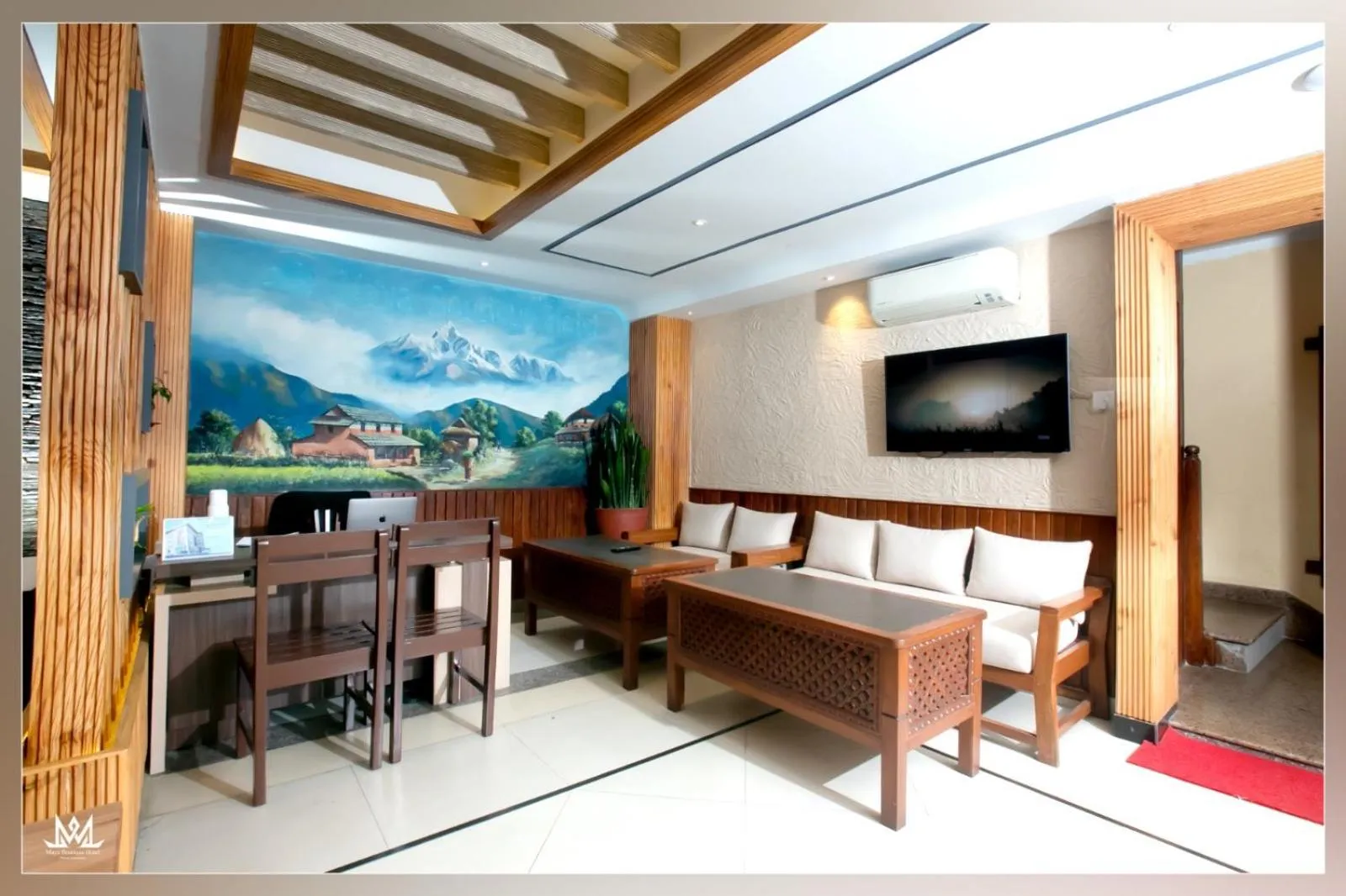 Communal lounge/ TV room in Maya Boutique Hotel