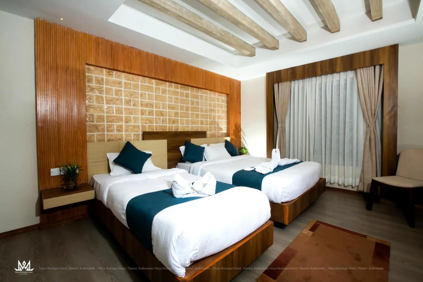 Bed in Maya Boutique Hotel