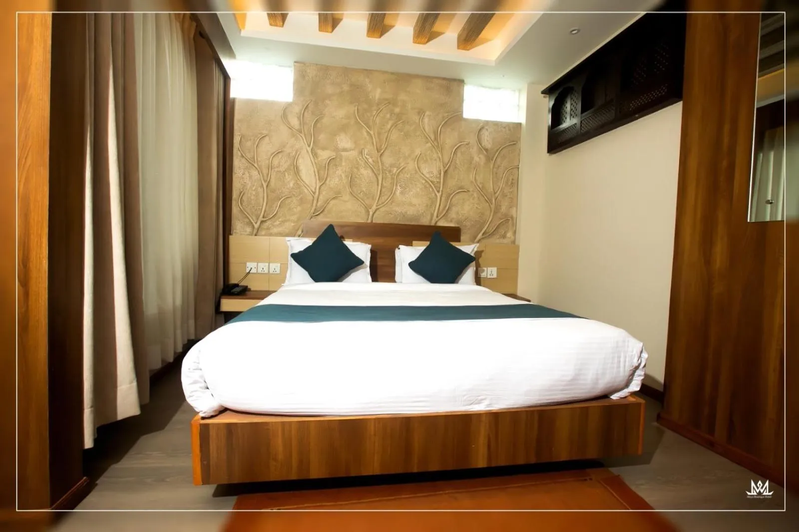 Bed in Maya Boutique Hotel