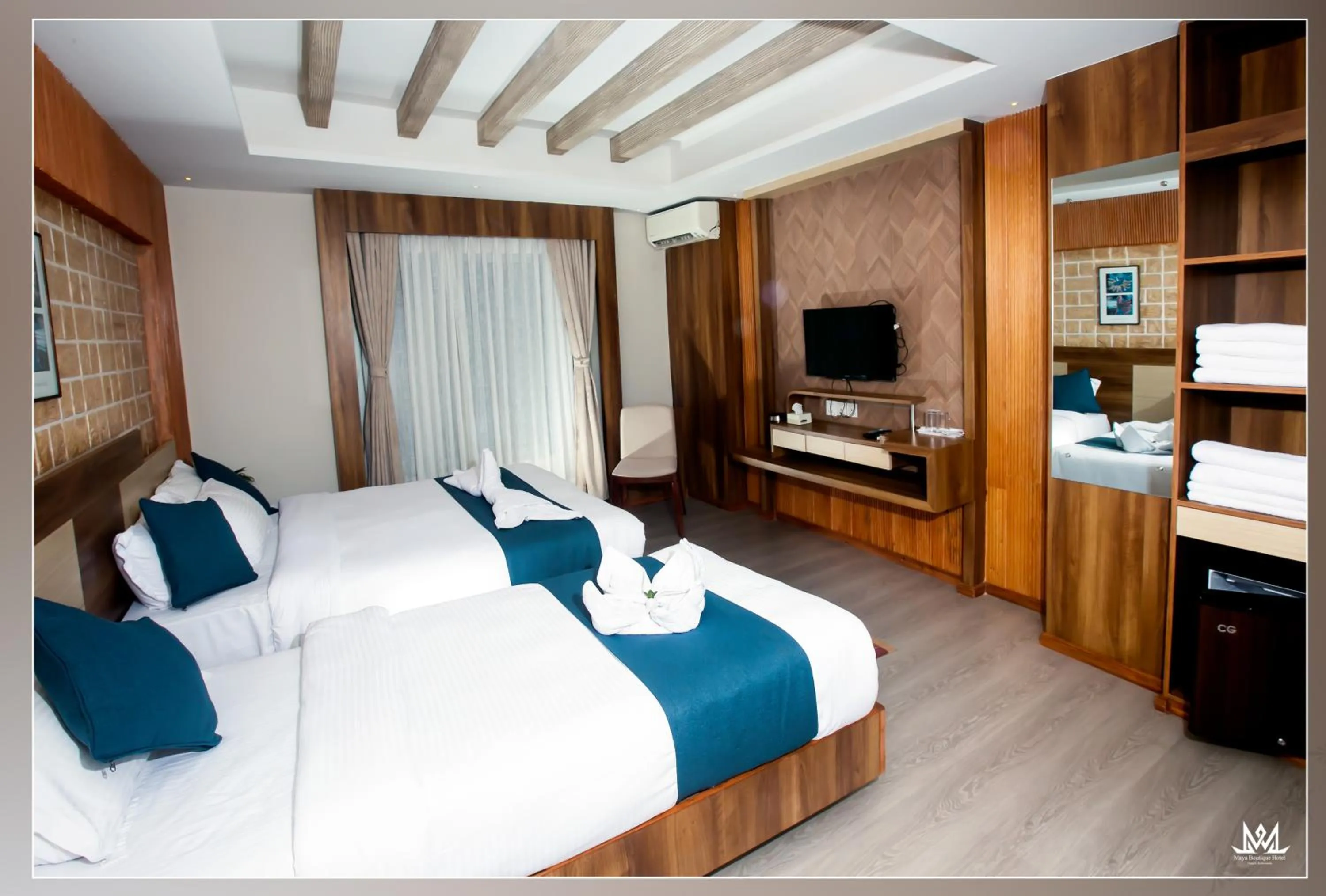 Bed in Maya Boutique Hotel