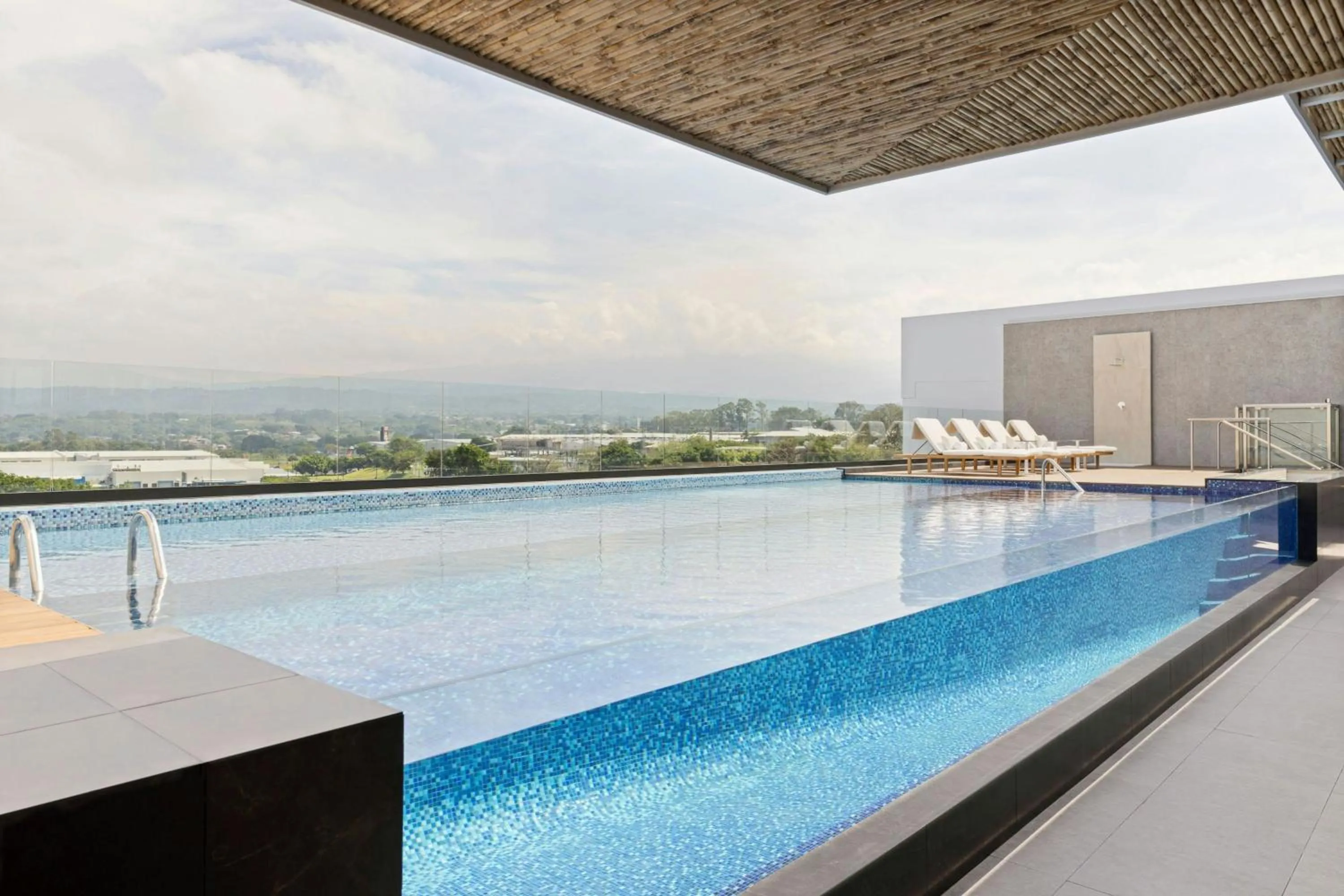 Swimming pool in AC Hotel San Jose Airport Belen