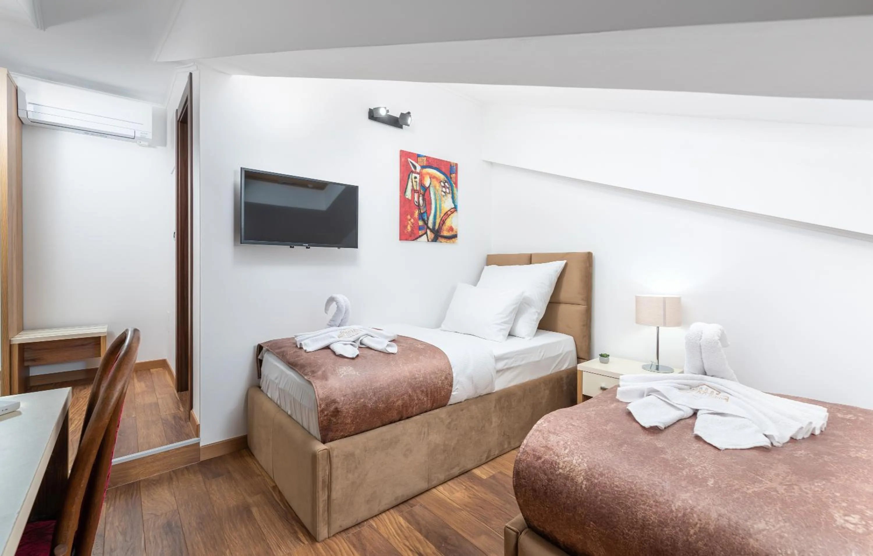 Bed in Hotel Dua Residence