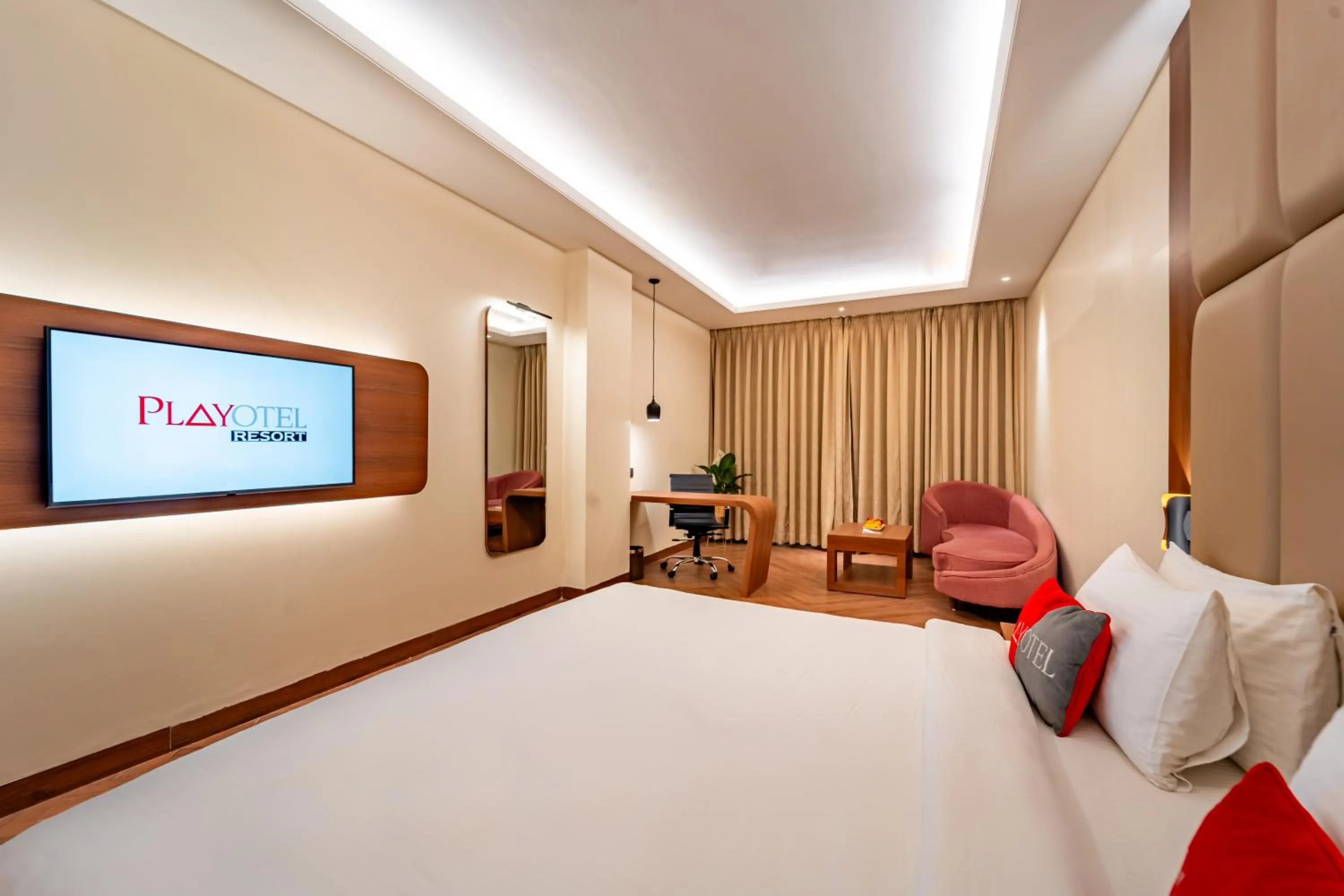 Bed in Playotel Resort Bhopal