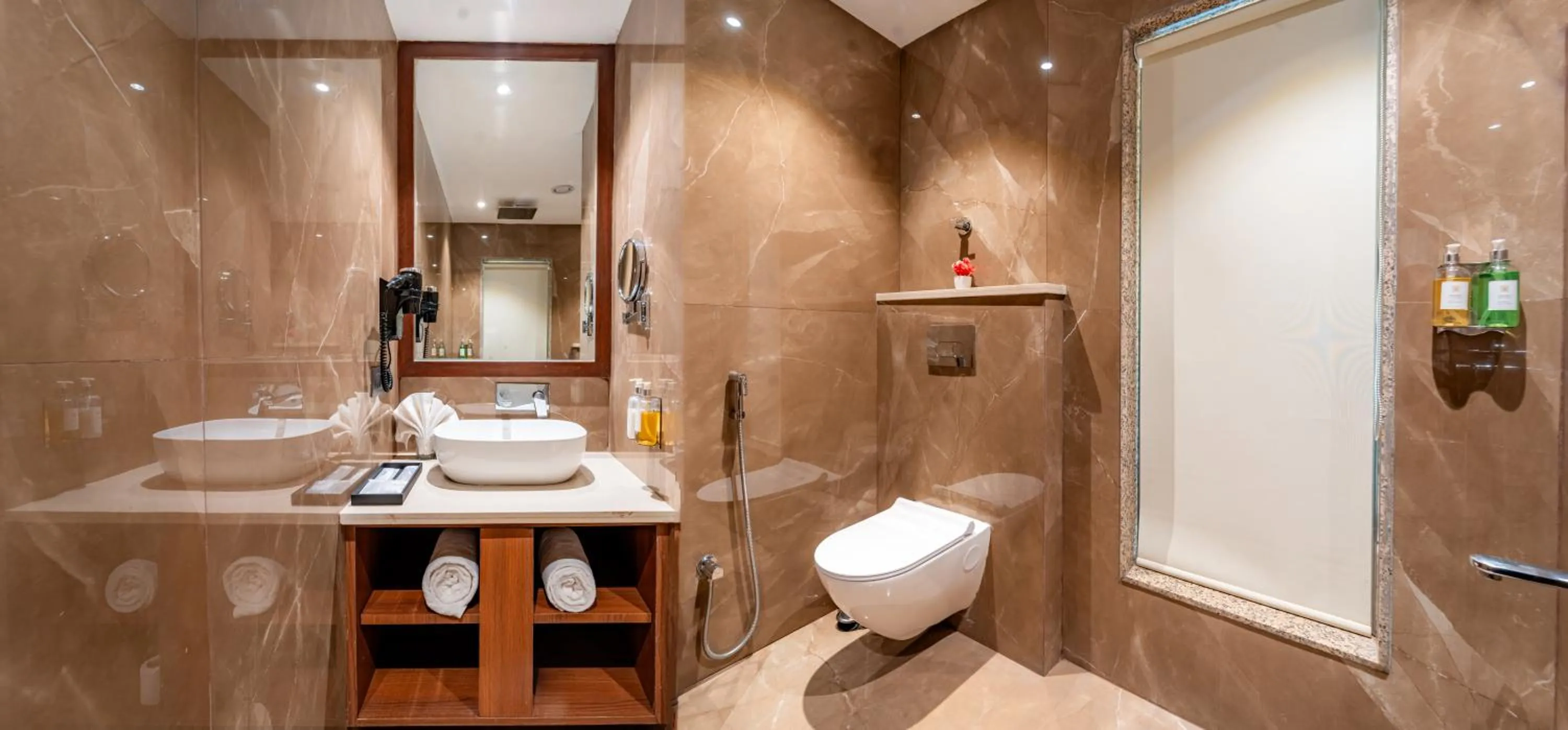 Shower in Playotel Resort Bhopal