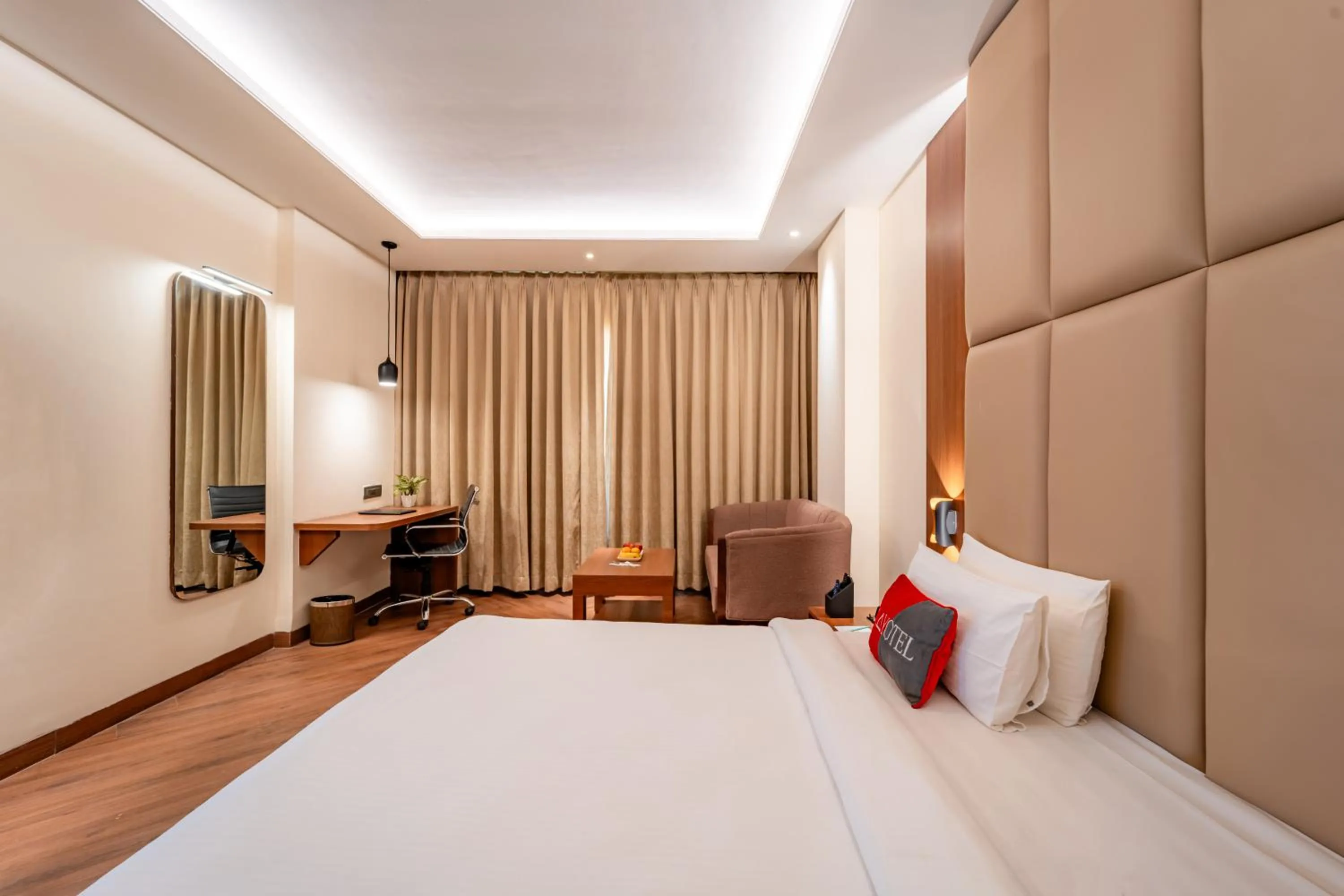 Bed in Playotel Resort Bhopal