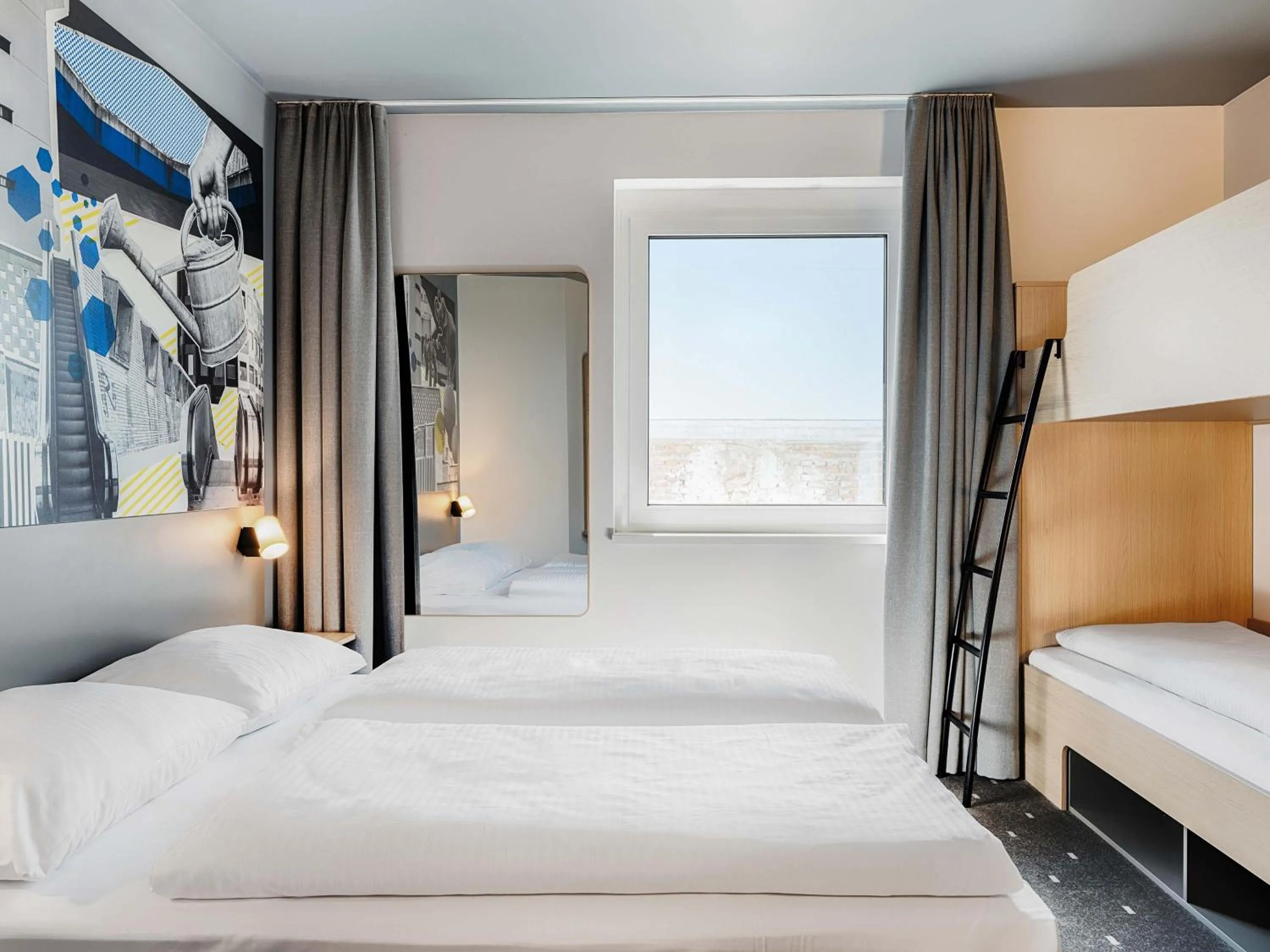 Photo of the whole room, Bed in B&B HOTEL Gießen-City