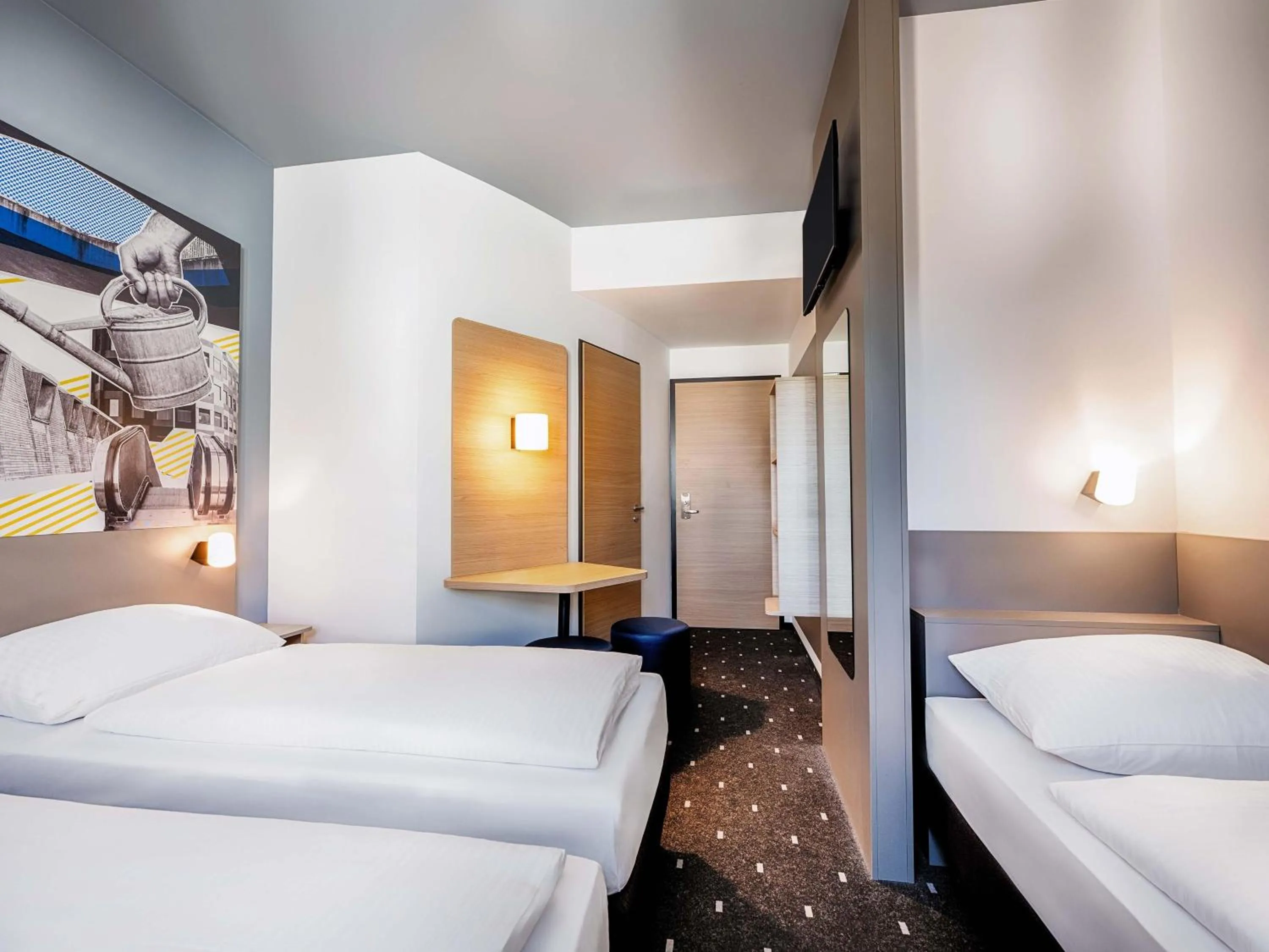 Photo of the whole room, Bed in B&B HOTEL Gießen-City