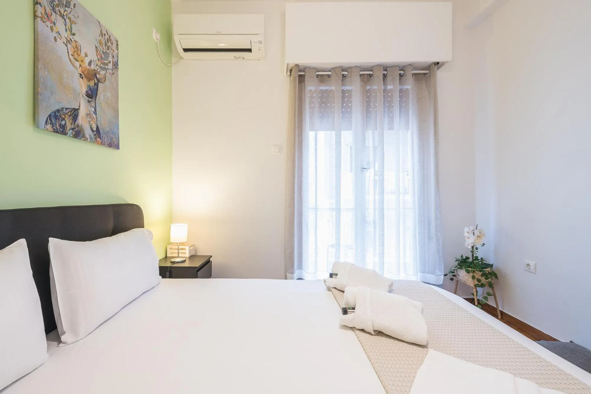 Bed in Erythros Boutique Suite By Cloudkeys