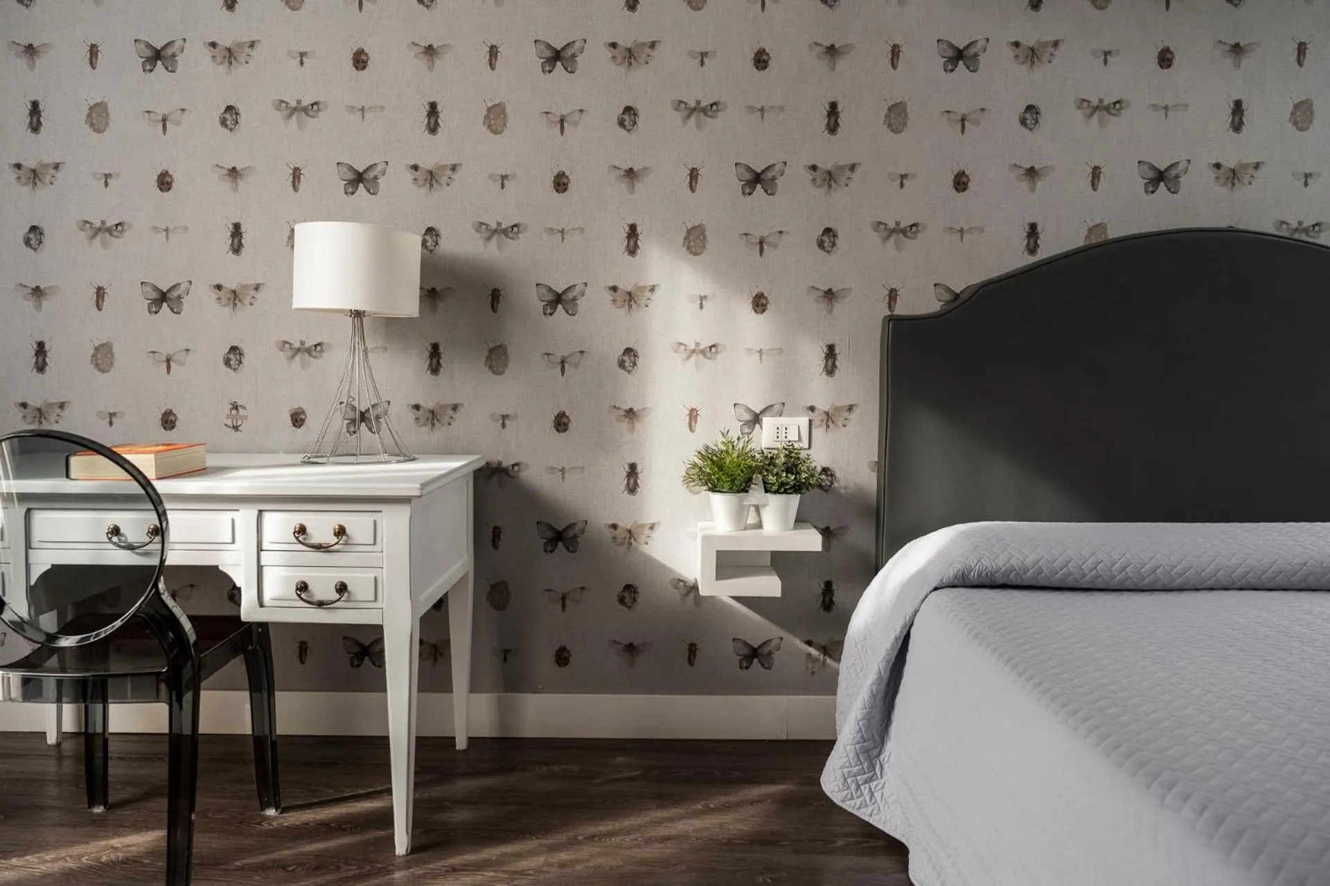 Bed in Maxxim Hotel & Loft