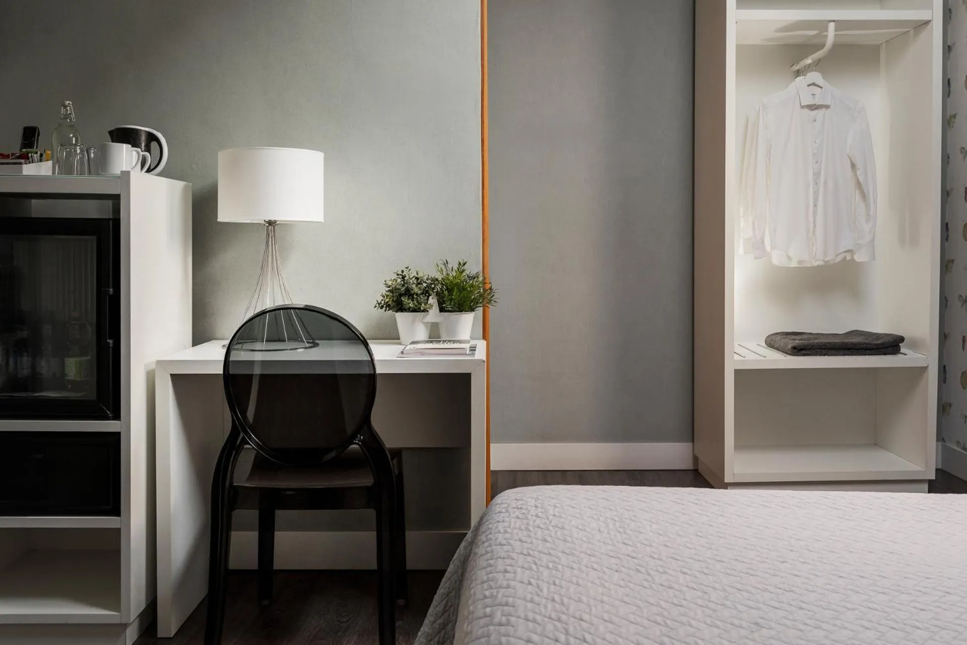 Bed in Maxxim Hotel & Loft