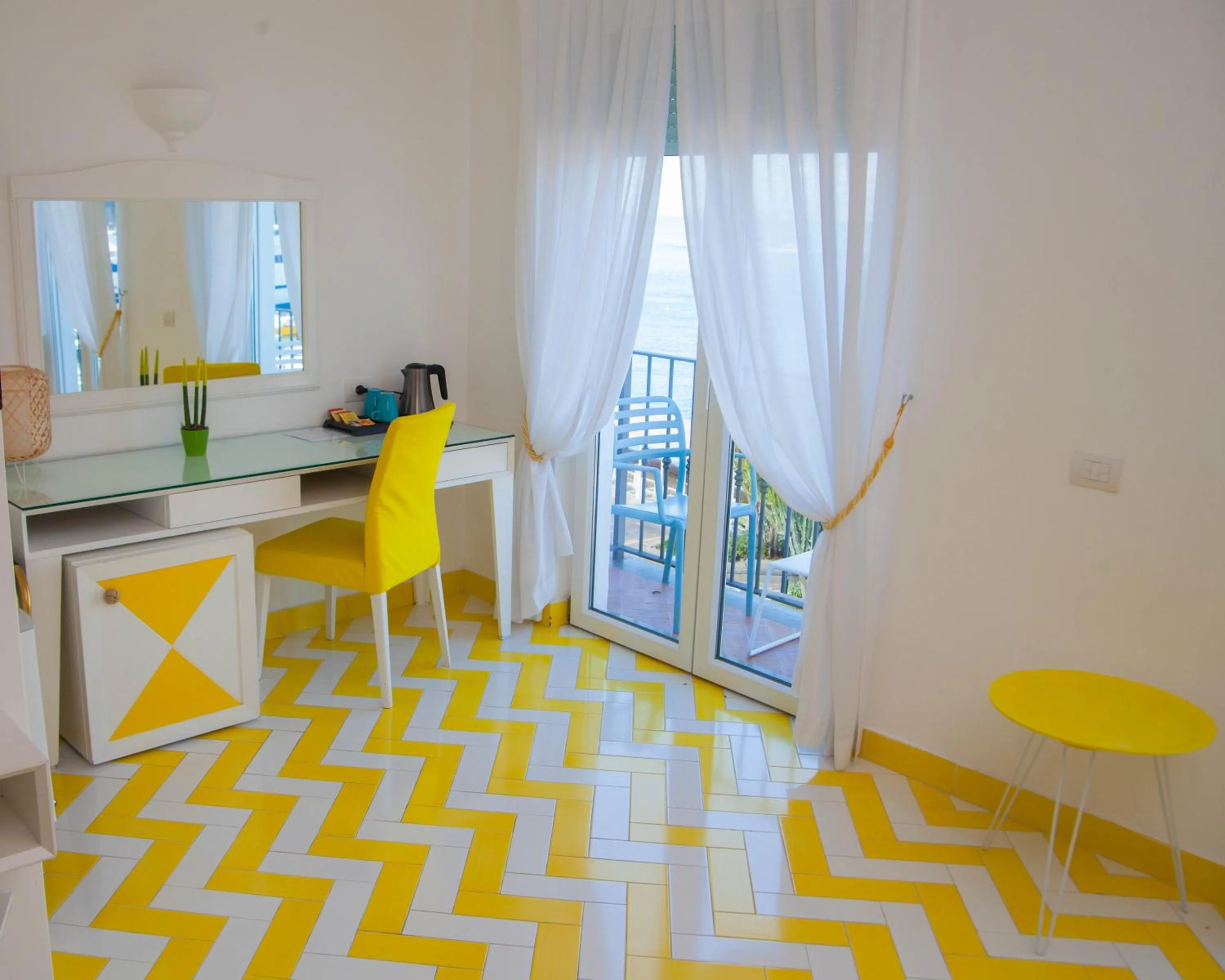 Seating area in Relais Maresca Luxury Small Hotel & Terrace Restaurant